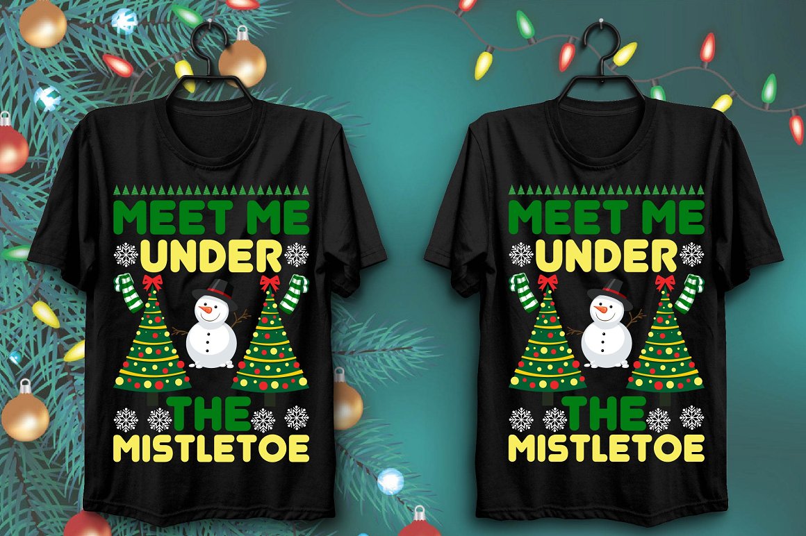 T-shirts with a colorful print of a snowman surrounded by two Christmas trees.