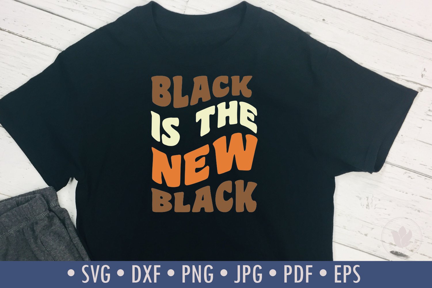 Black T-shirt with a bright print with the word "Black is the new black".