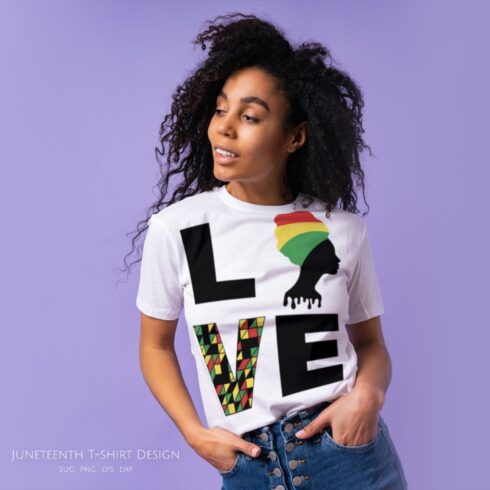 Afro girl in a white t-shirt with a gorgeous print saying "Love".