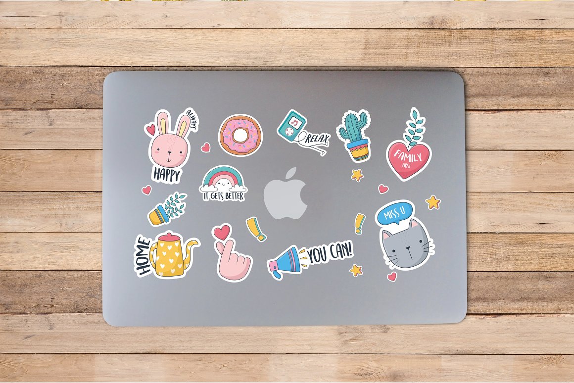 Laptop with cartoon stickers.
