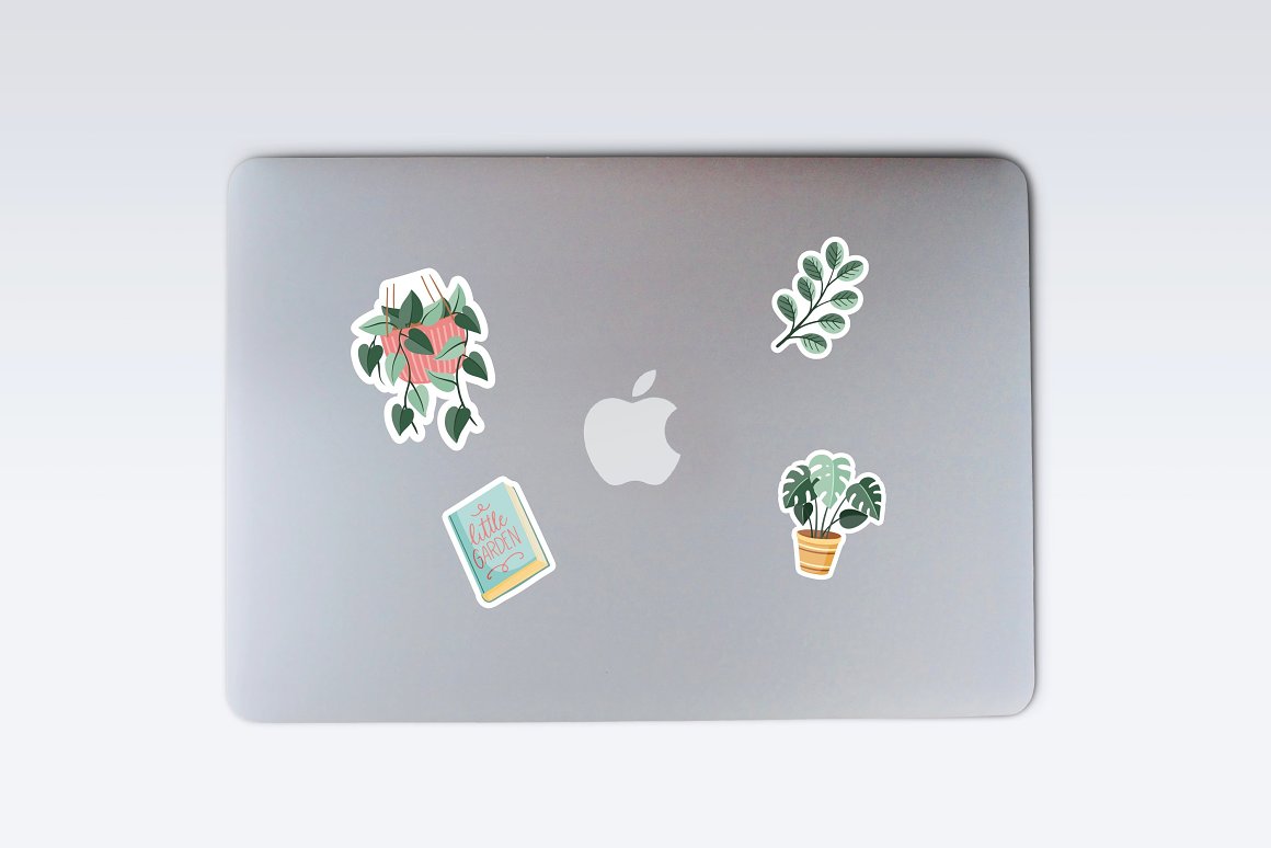 Notebook with colorful stickers of flowerpots with flowers.
