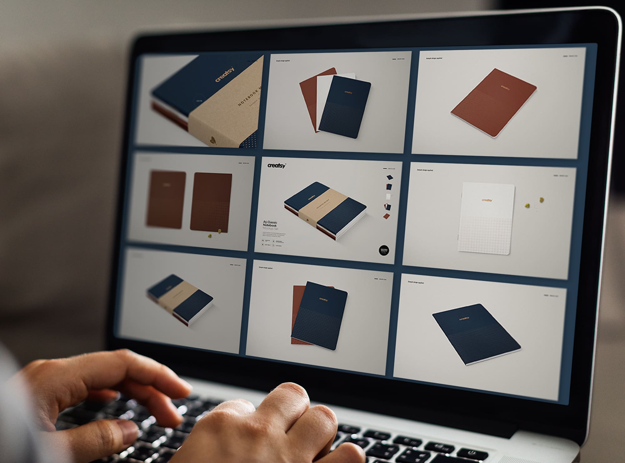 Laptop on screen with images of colorful A5 classic notebook mockups.