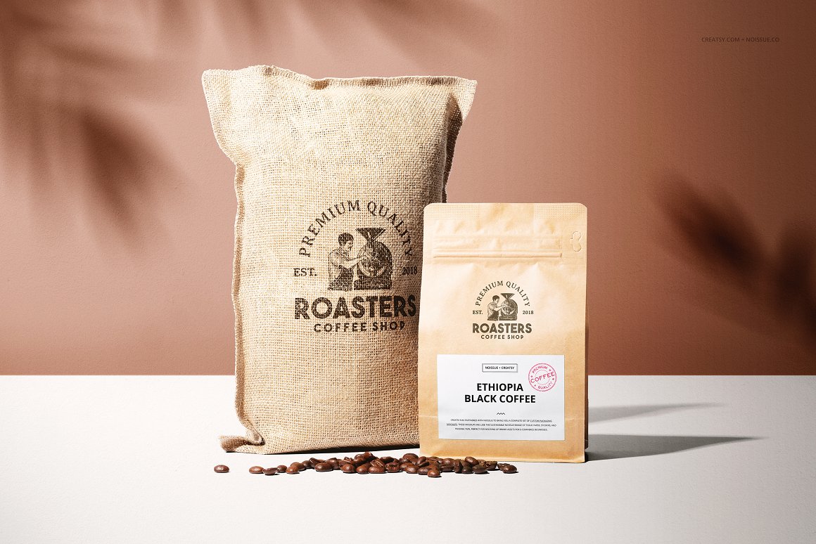Kraft bag with coffee and a white label with the lettering "Ethiopia black coffee" and bag with the lettering "Roasters" and coffee beans.