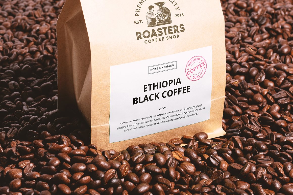 Kraft bag with coffee and a white label with the lettering "Ethiopia black coffee" and coffee beans.