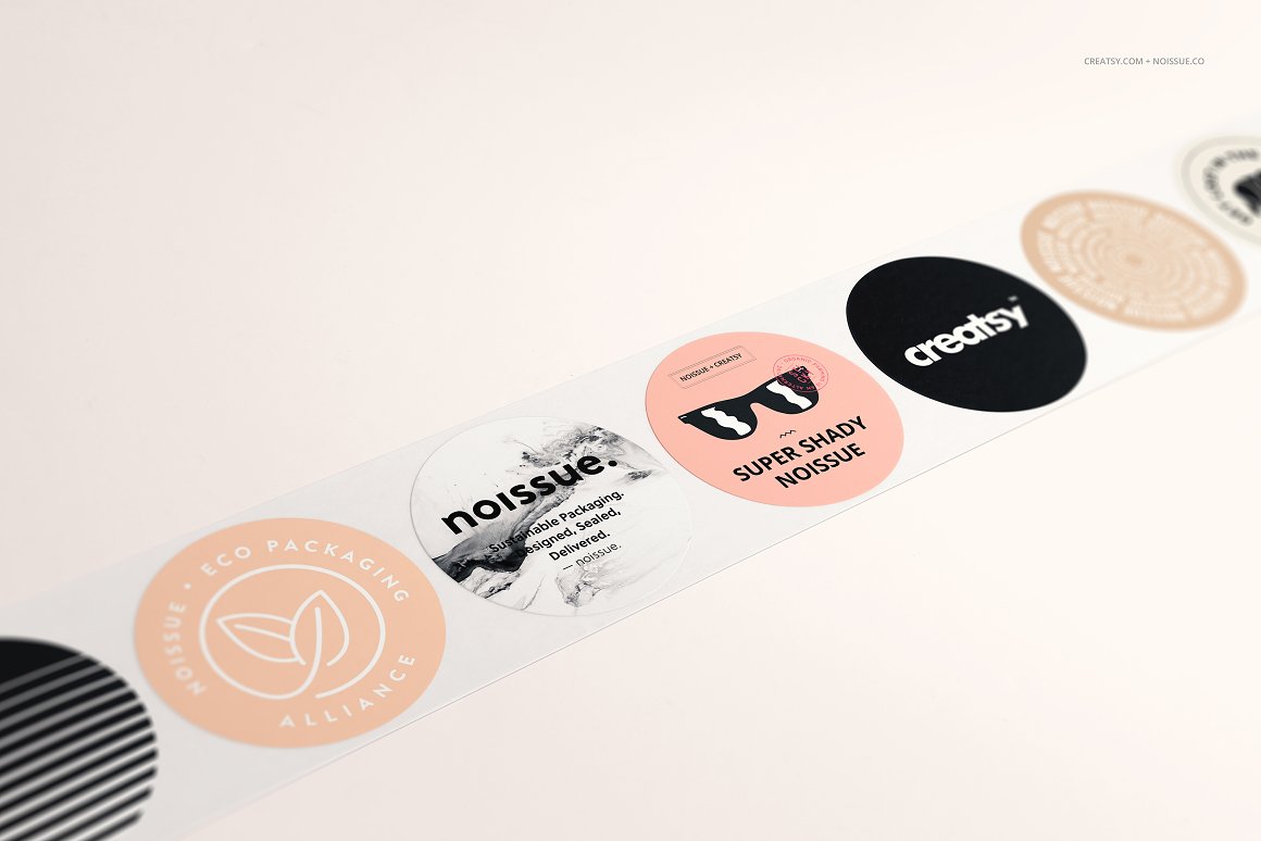 A set of 7 stickers in pink, black and beige.