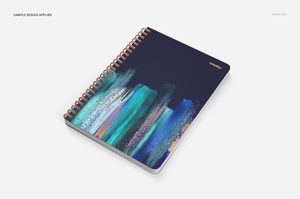 Charming image of a square holes notepad in blue with brush strokes