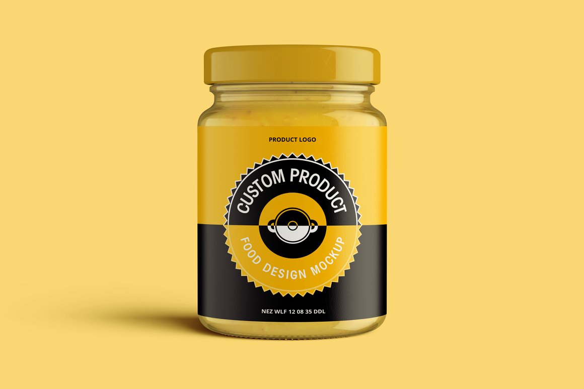 A glass jar with a yellow lid and a black and yellow label with the lettering "Custom product food design mockup".