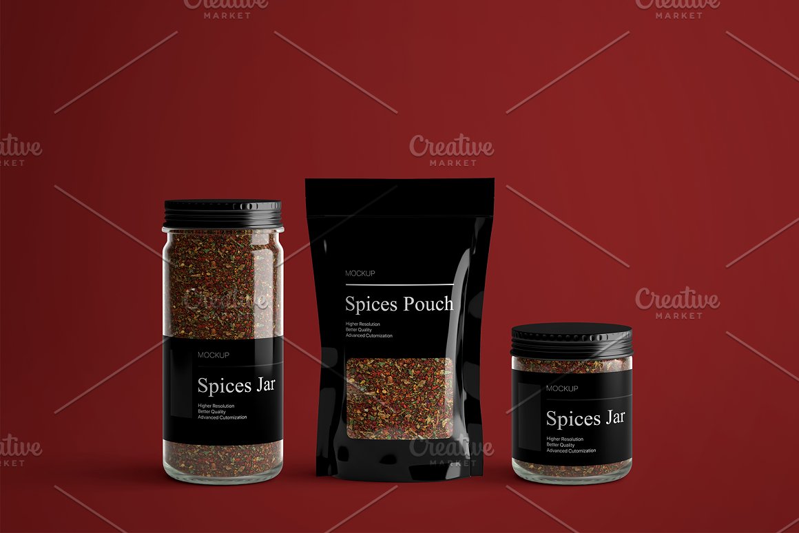 A set of 2 glass spice jars with a black cover and black label and a black zip bag with spices on a red background.