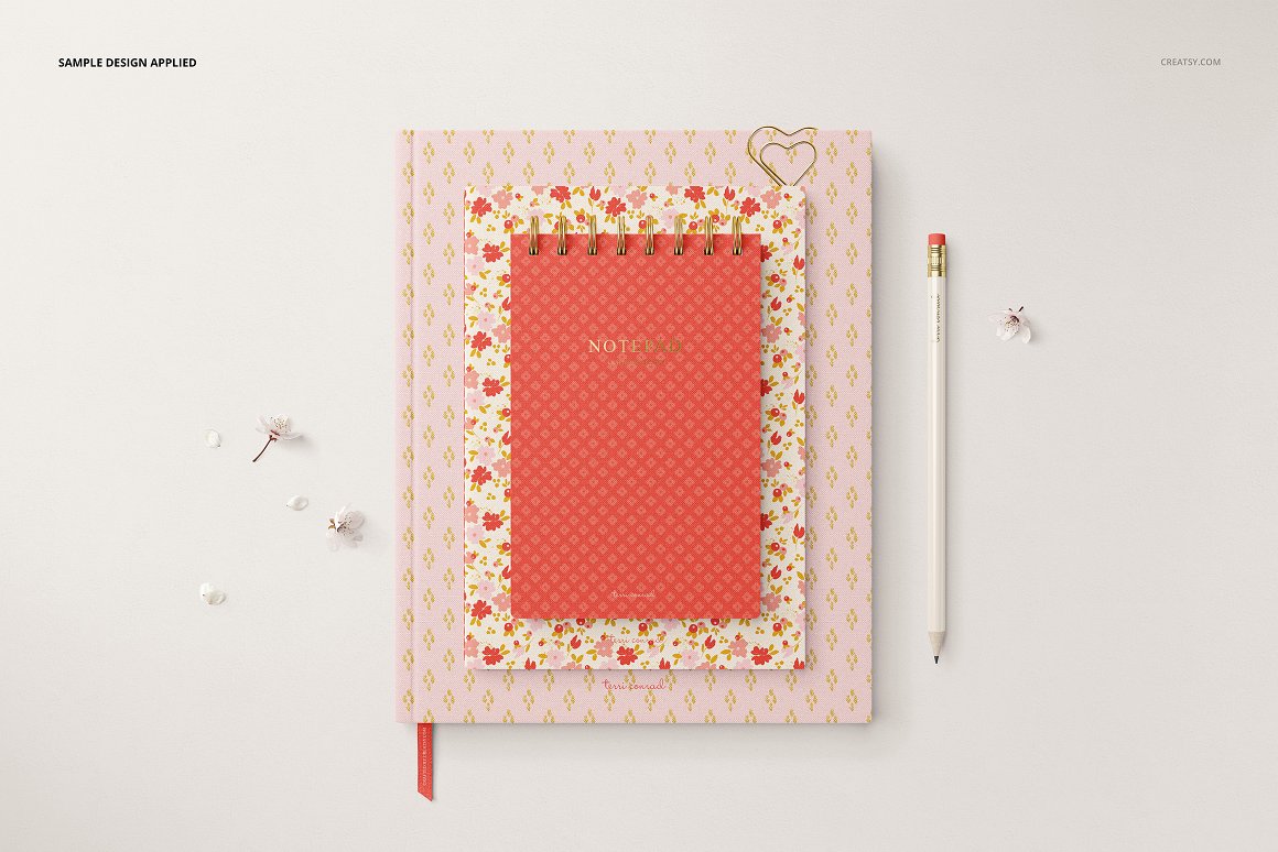 Images of stationery with patterns of flowers in red and pink color.