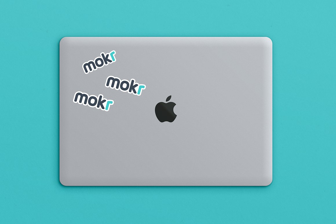 Macbook with a lovely sticker "mokr".