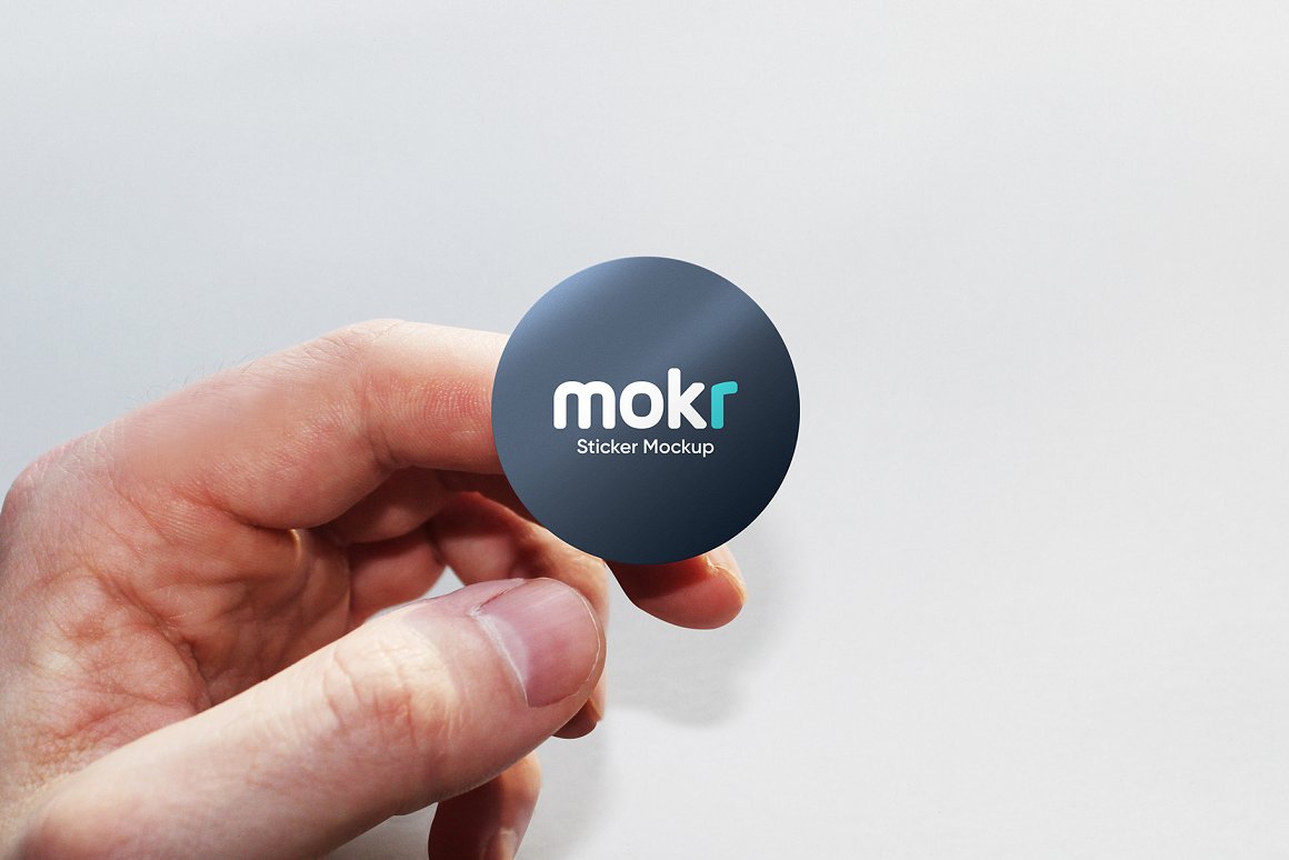 Lovely sticker mockup in round shape in black color with lettering.