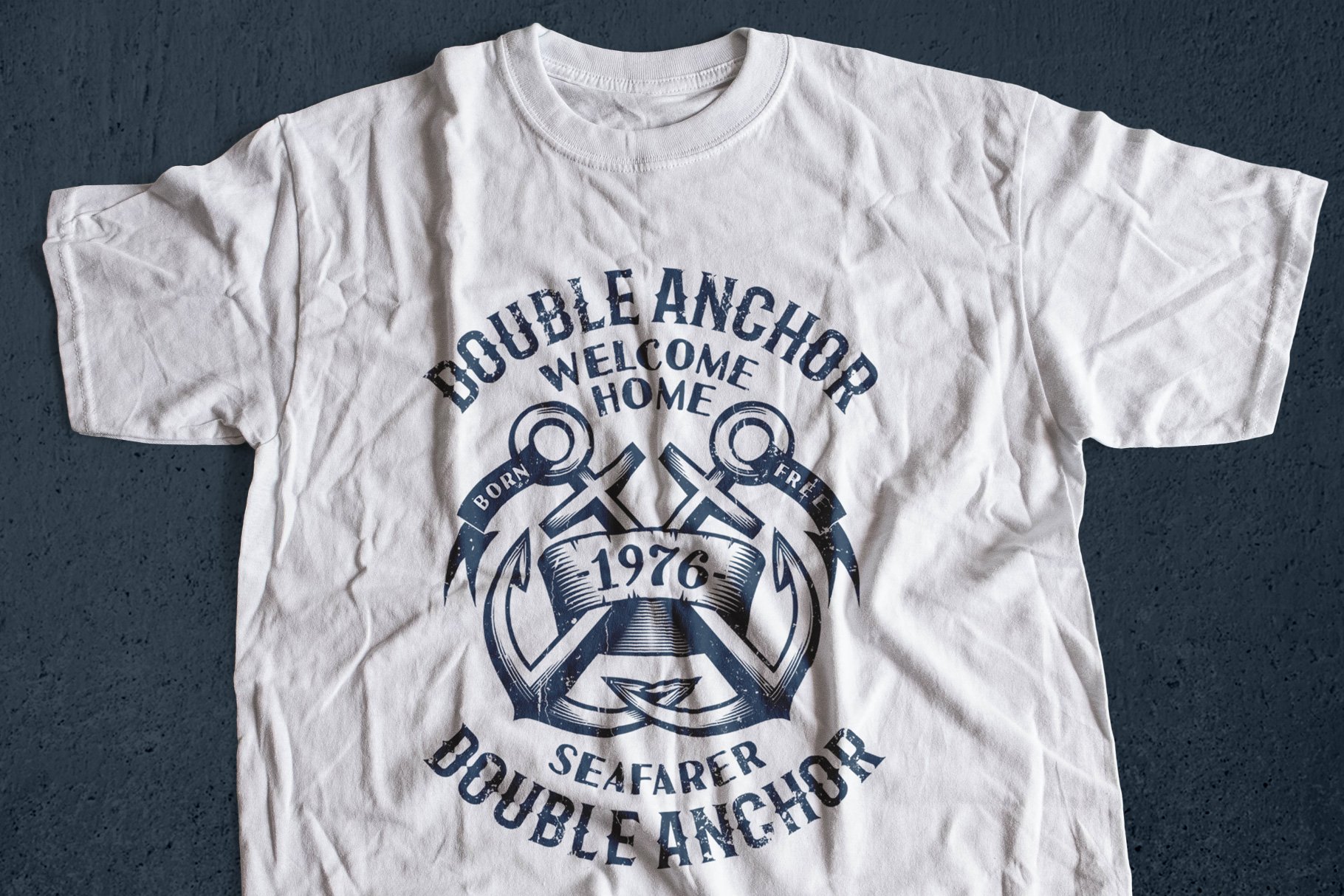 White t-shirt with a grey anchor print.