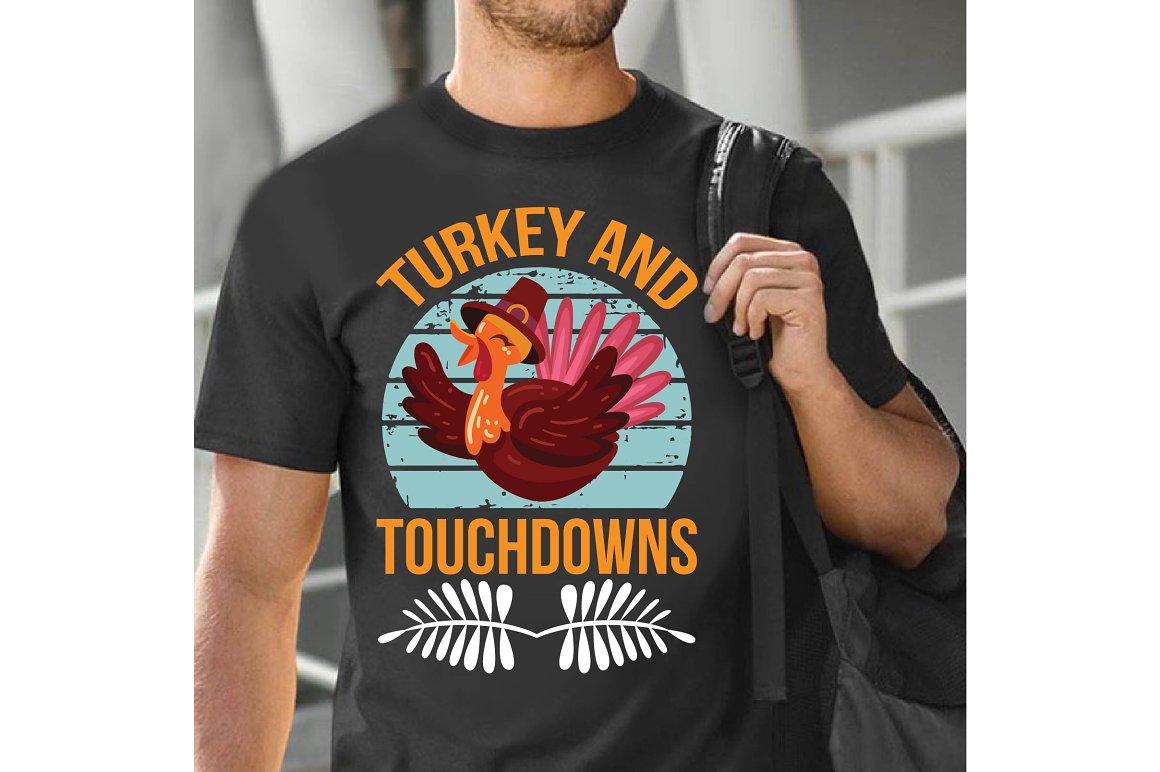 Black t-shirt with a cute print of a turkey in a cowboy hat.