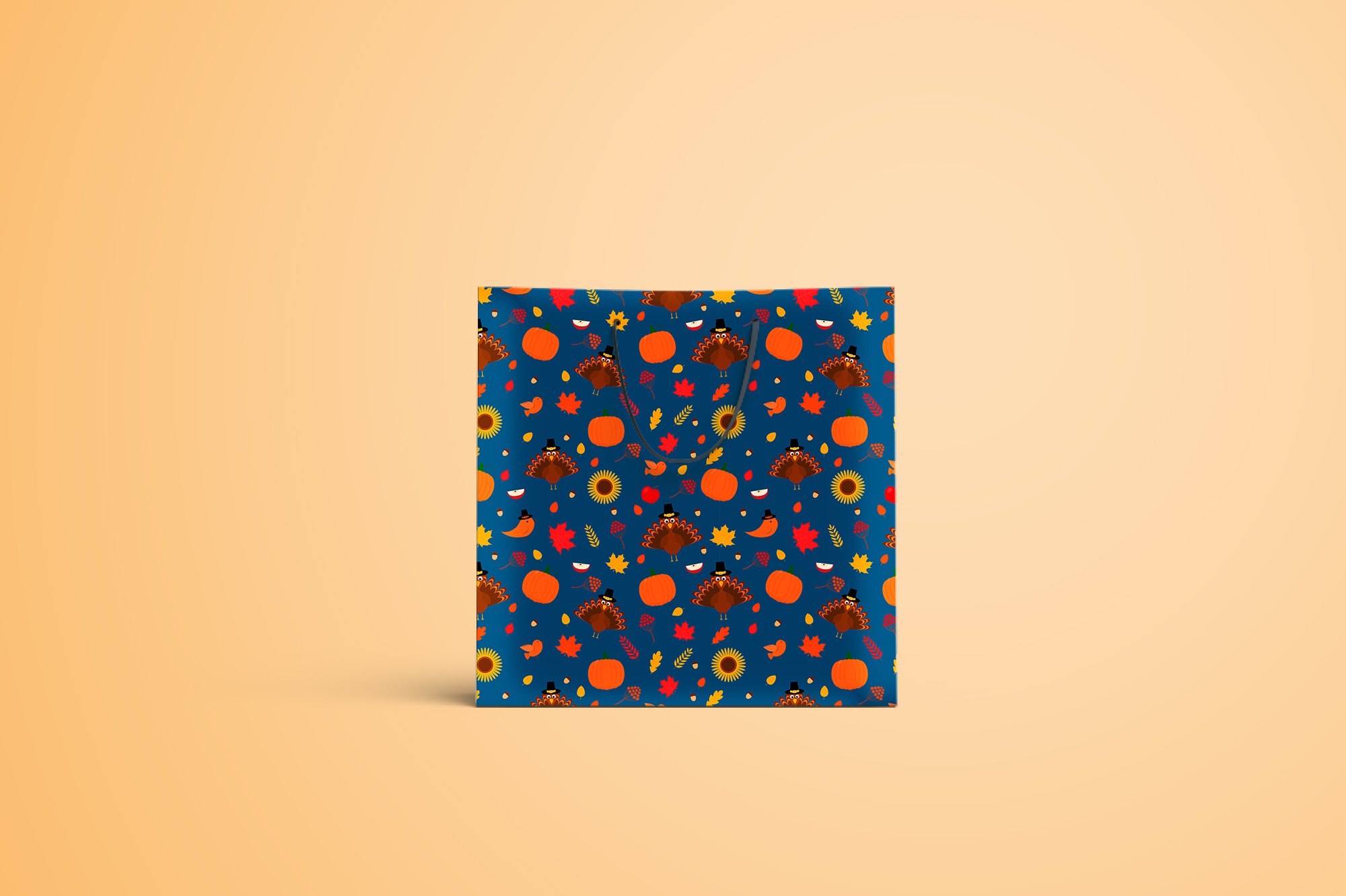 Festive blue paper package with a small Thanksgiving print.