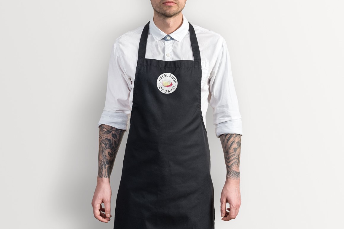 Black apron with beautiful hard cheese print.