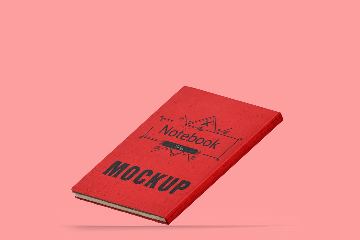 A red vintage notebook mockup on a pink background.