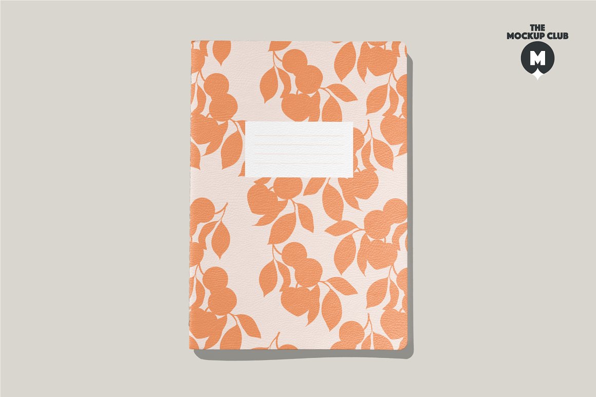Pink notebook A4 mockup with peach images lemons on a gray background.