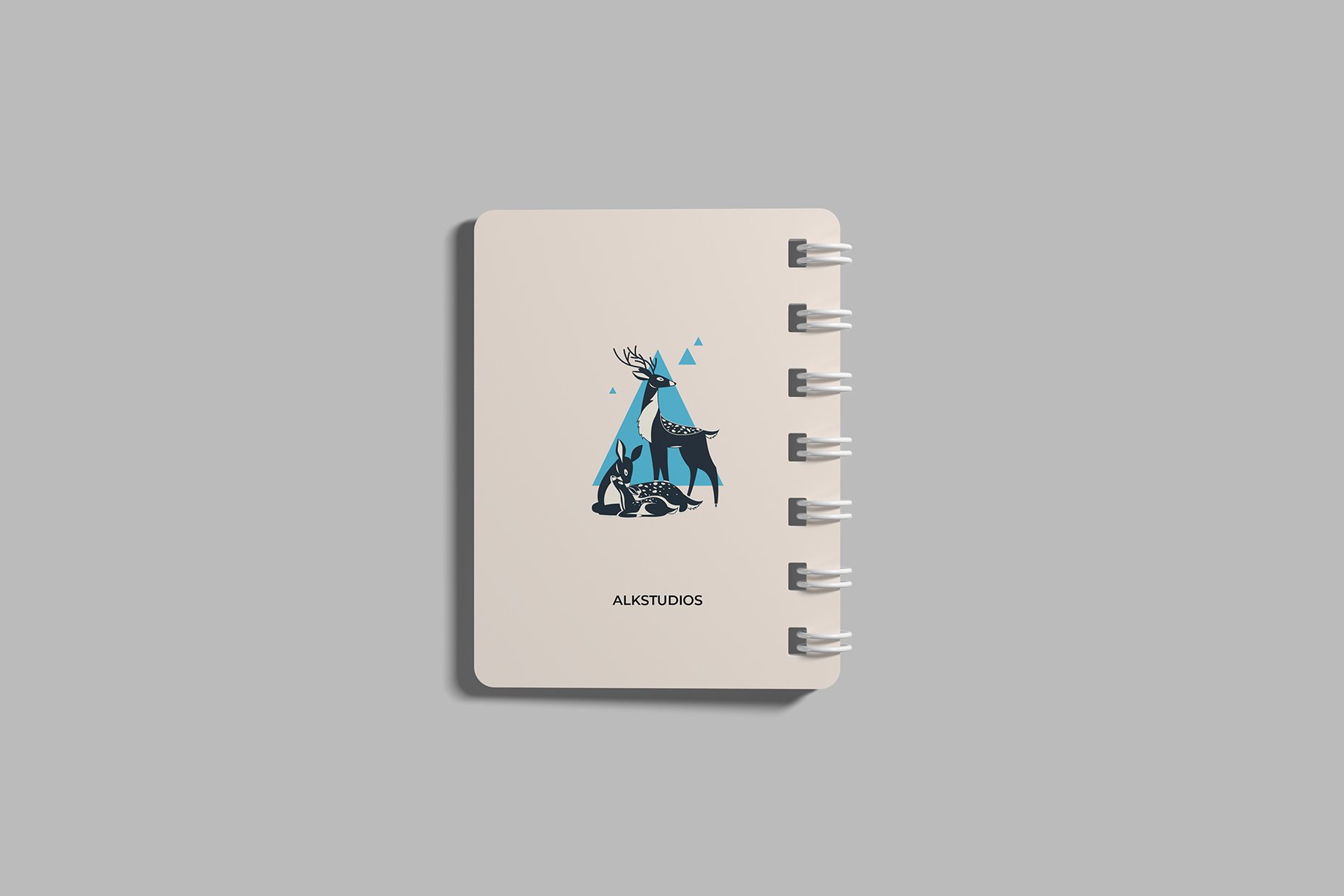 Blue creative graphic on a white notebook.