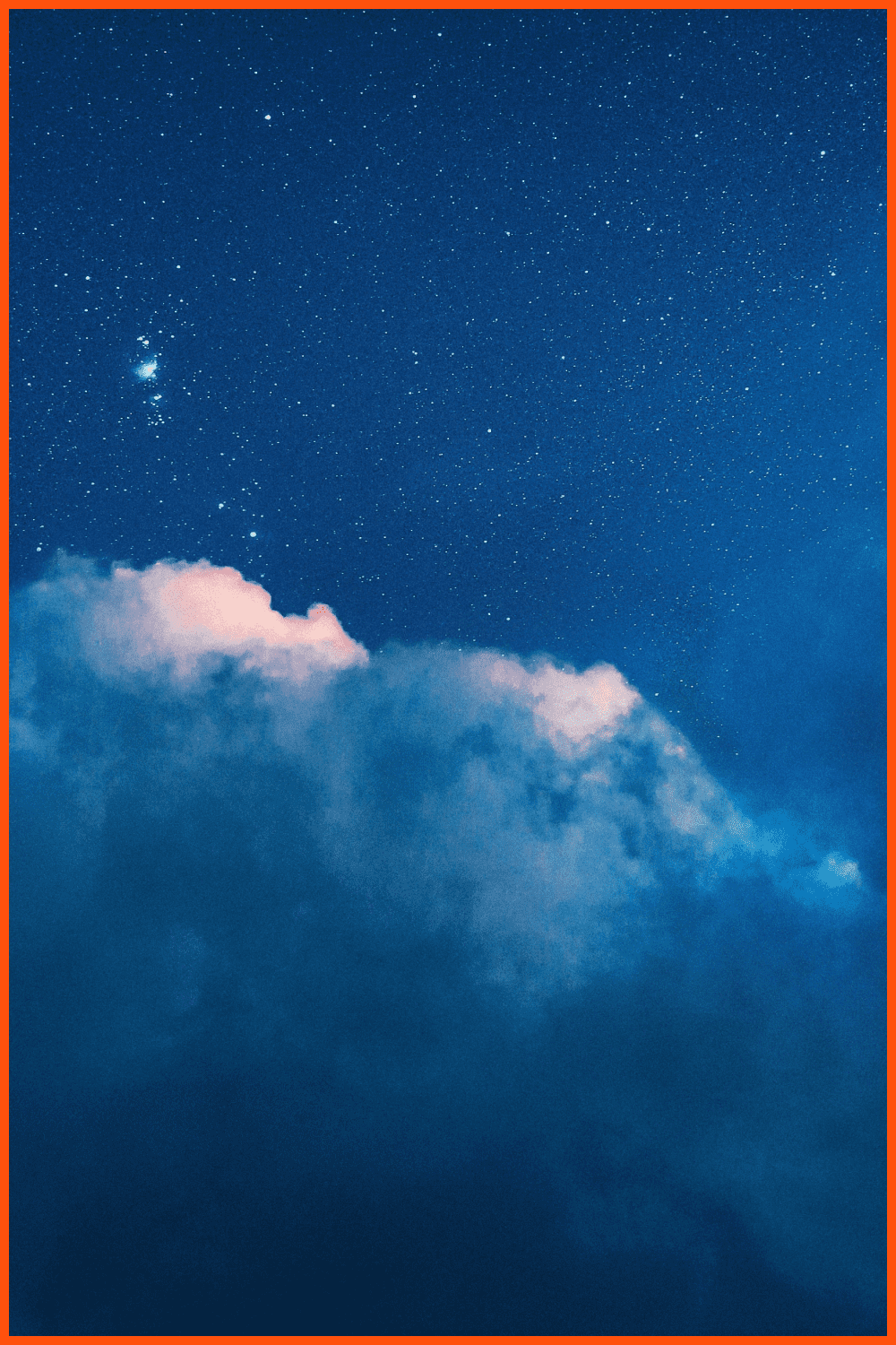 Photo of blue clouds against the starry sky.