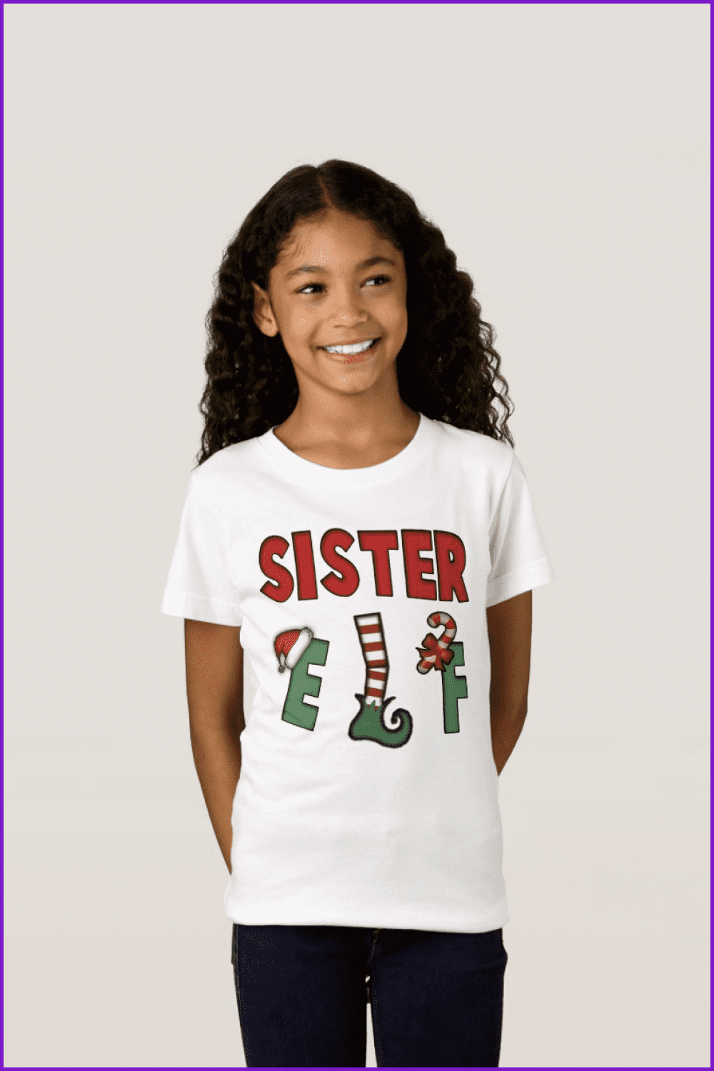 Girl in a white t-shirt with inscription Sister Elf.