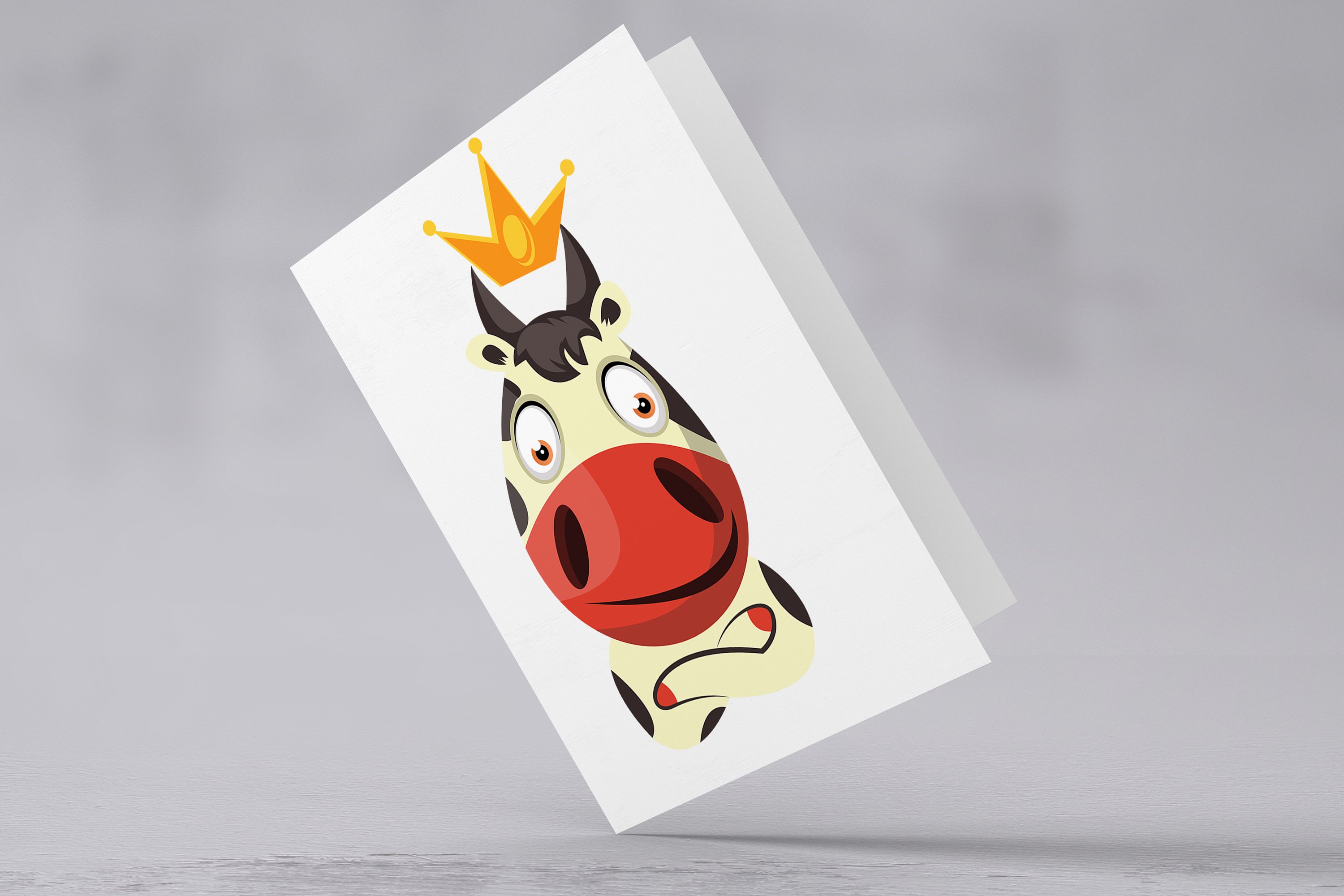 Image postcard with a cheerful emoticon cow.