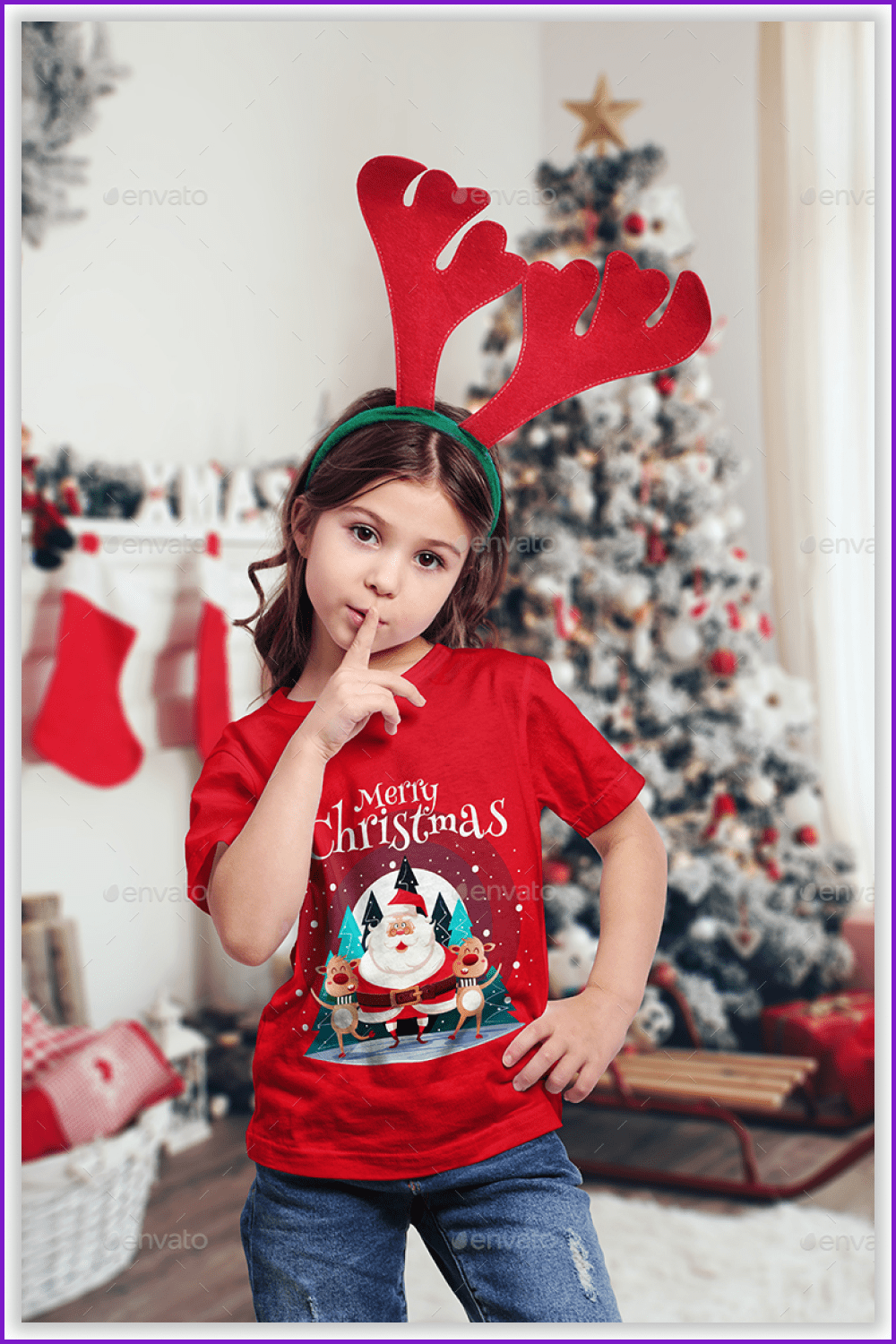 Girl with a bright mockups for kids with Santa Claus and funny deer.