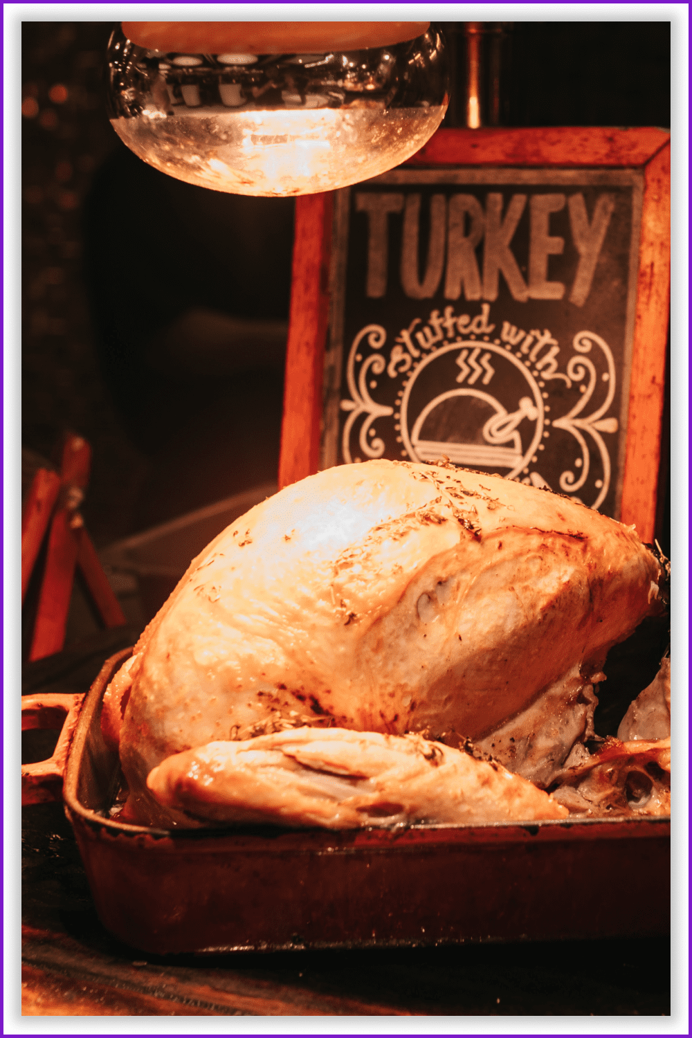 Roasted Turkey on a tray in passing background for a cafe.