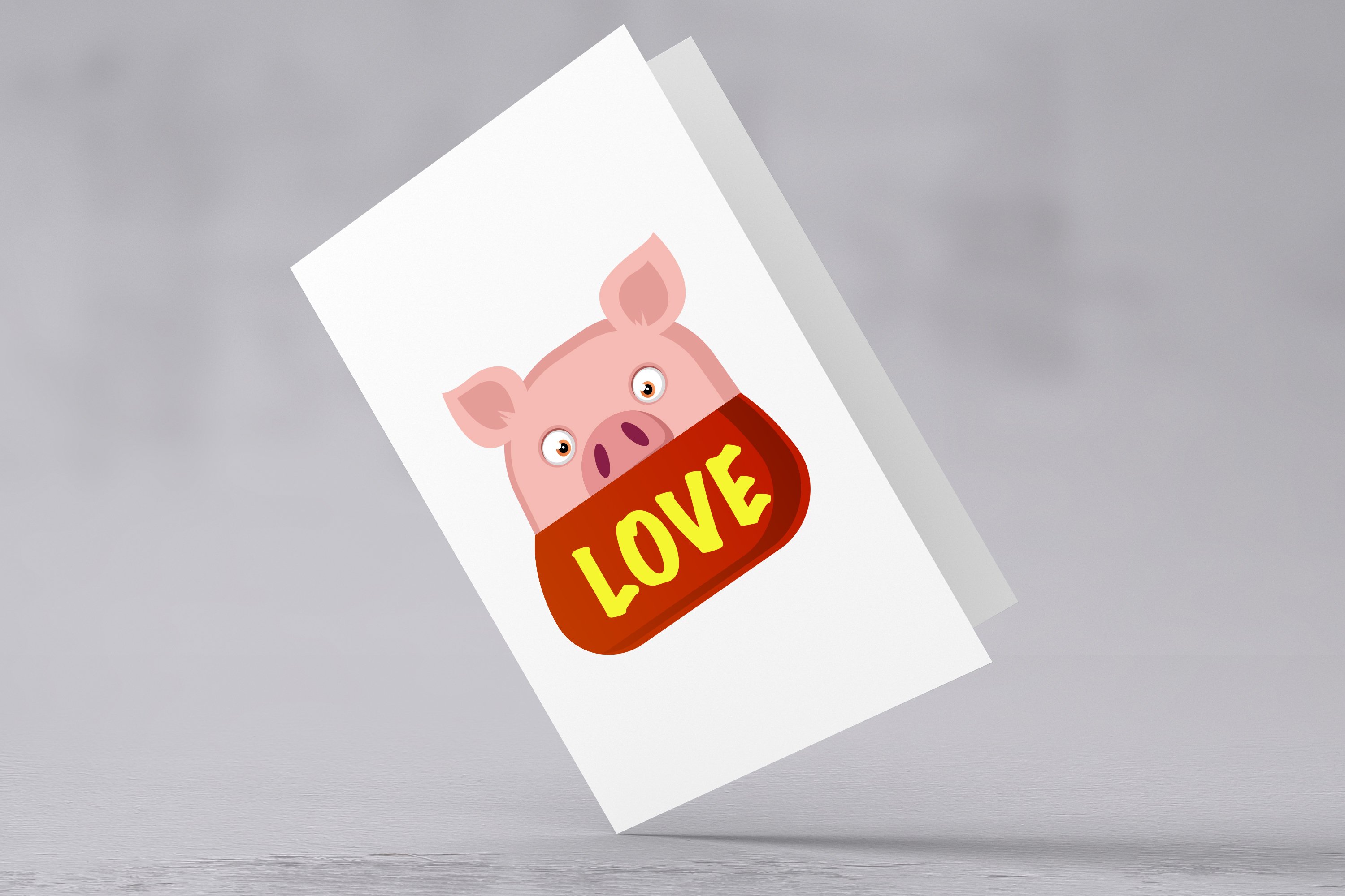 Picture of a postcard with a wonderful pig emoticon.