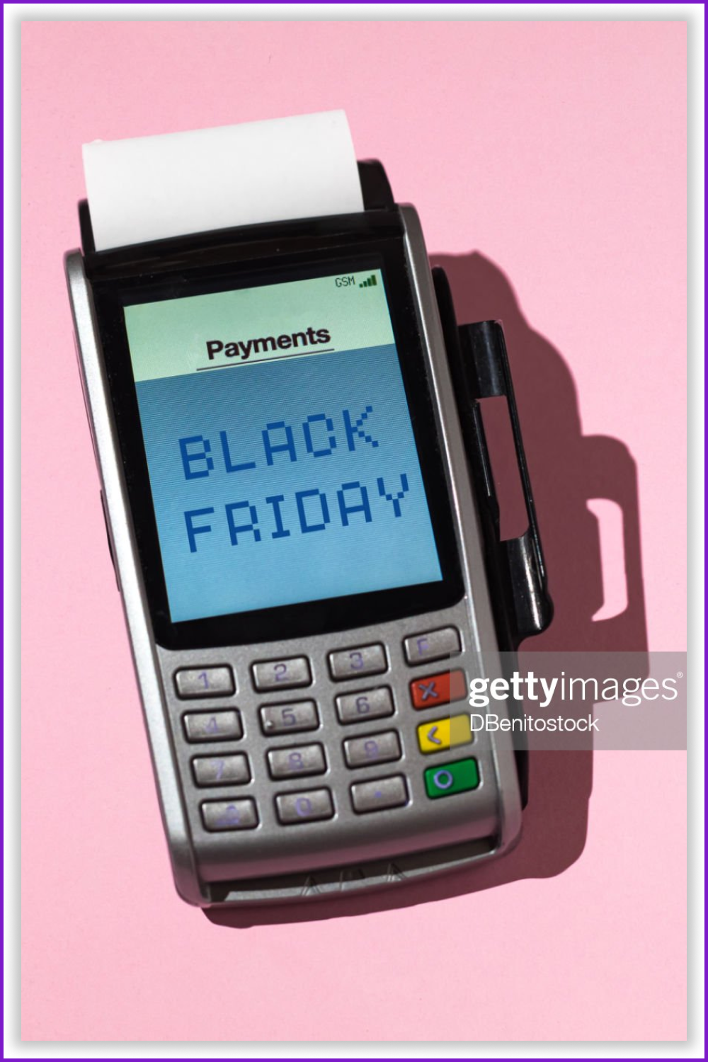 Dataphone with text on the screen “Black Friday” on the pink background.