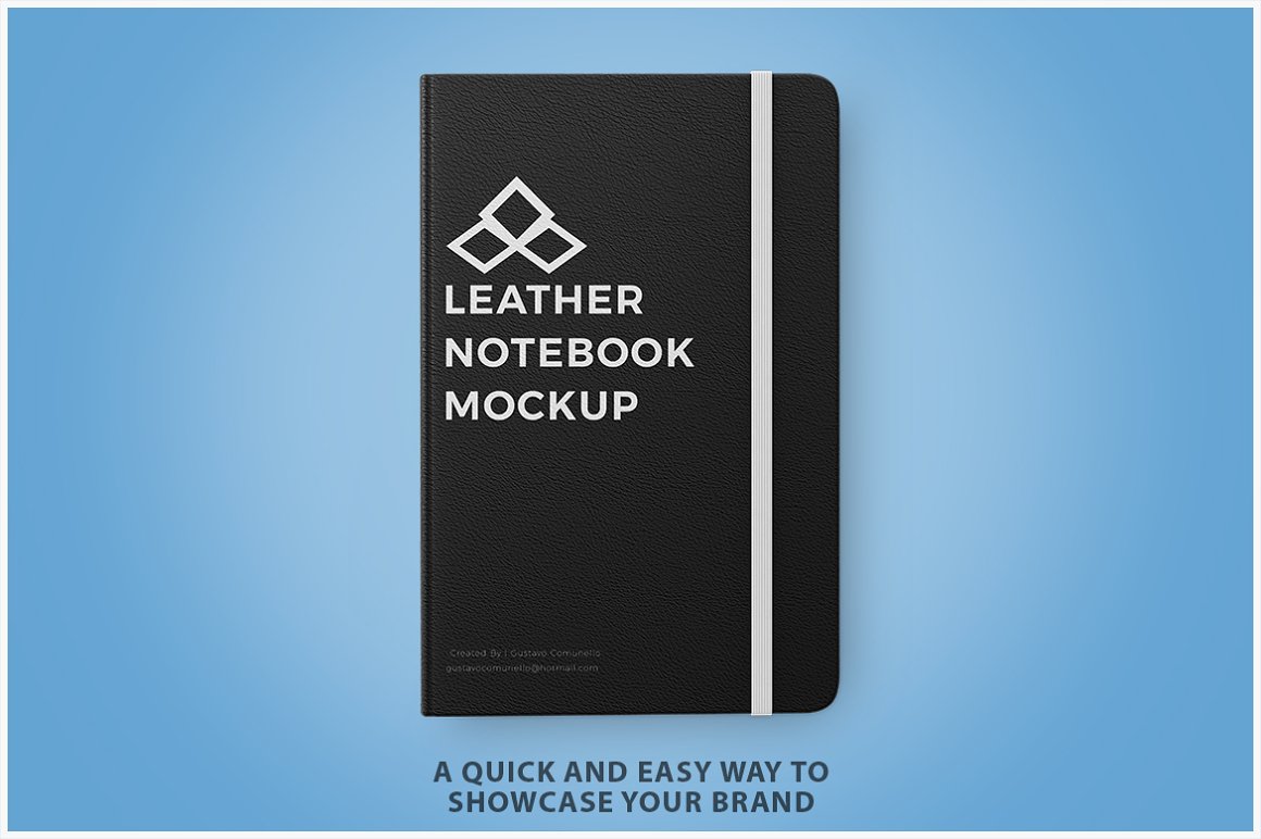 Black mockup leather notebook with a white rubber band bookmark on a blue background.