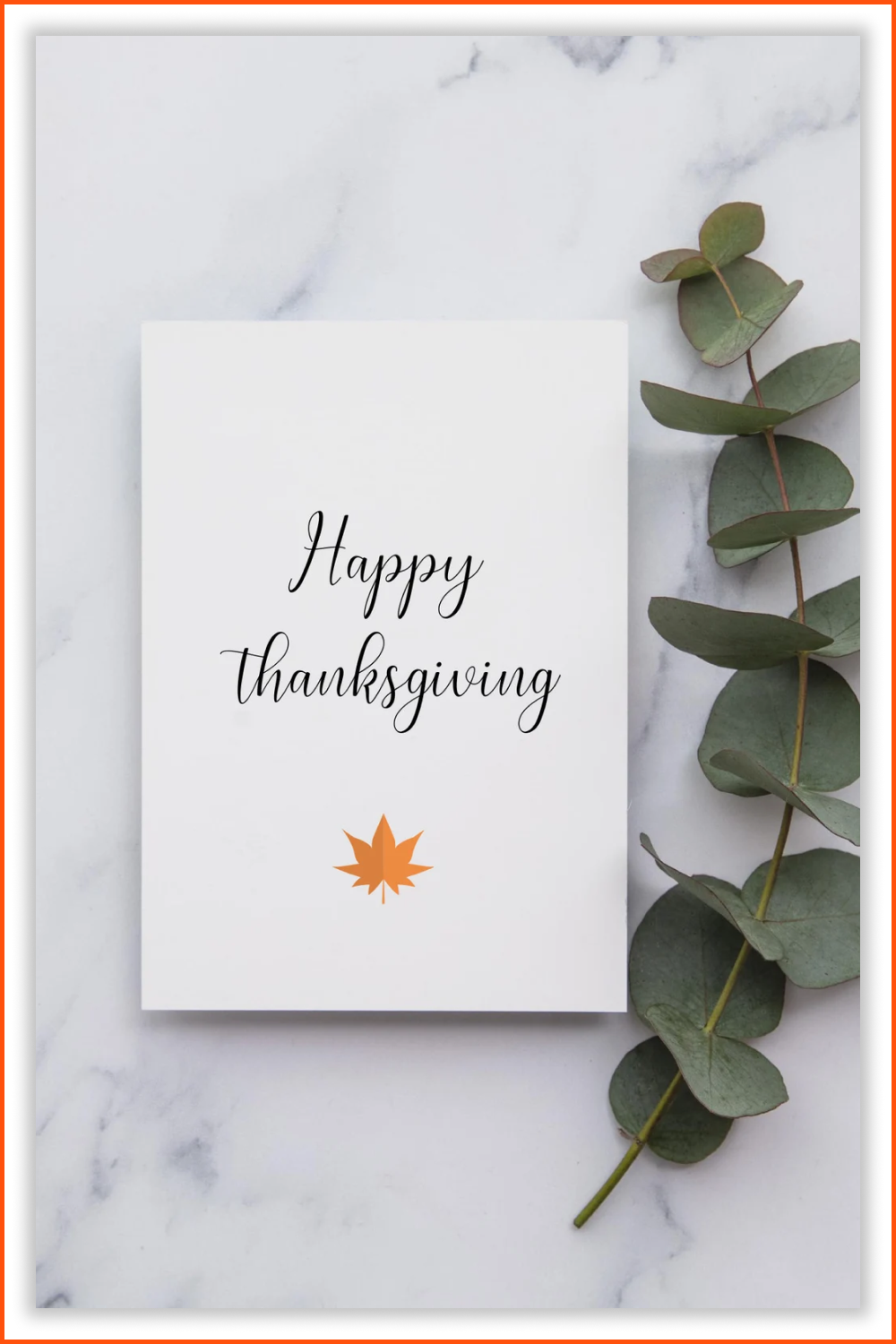 Thanksgiving card with yellow leaf on white background and green twig beside.