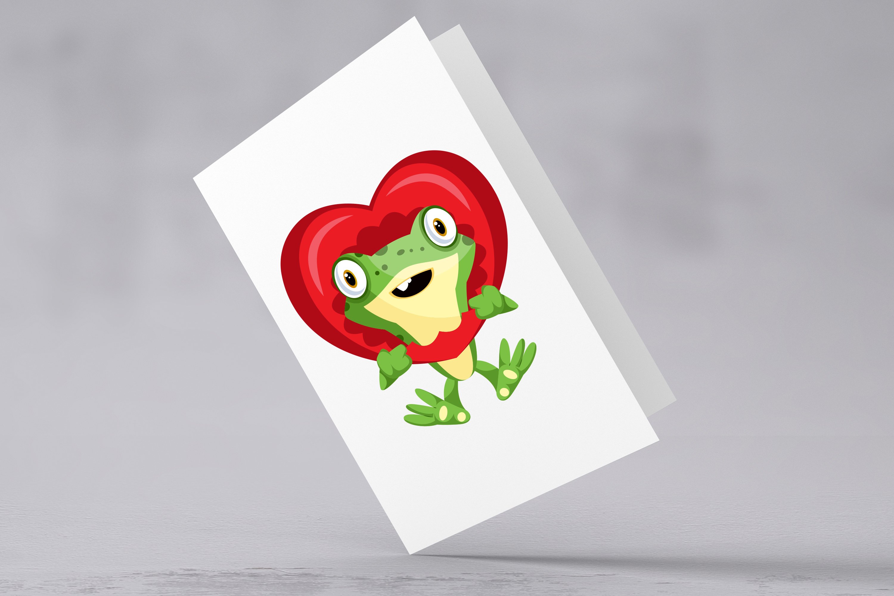So lovely frog on the white greeting card.