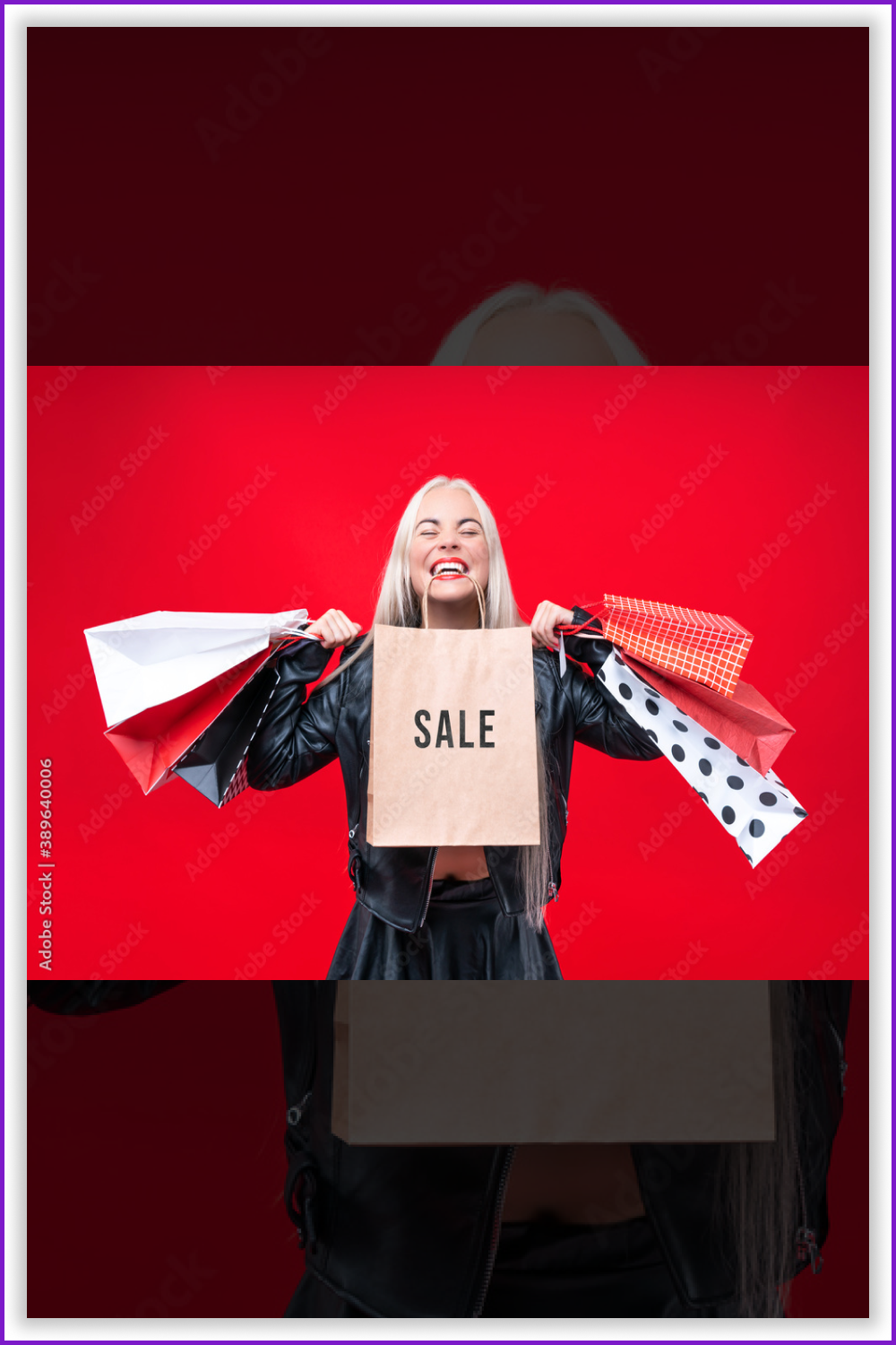 Smiling woman with the shopping bags on the red background.