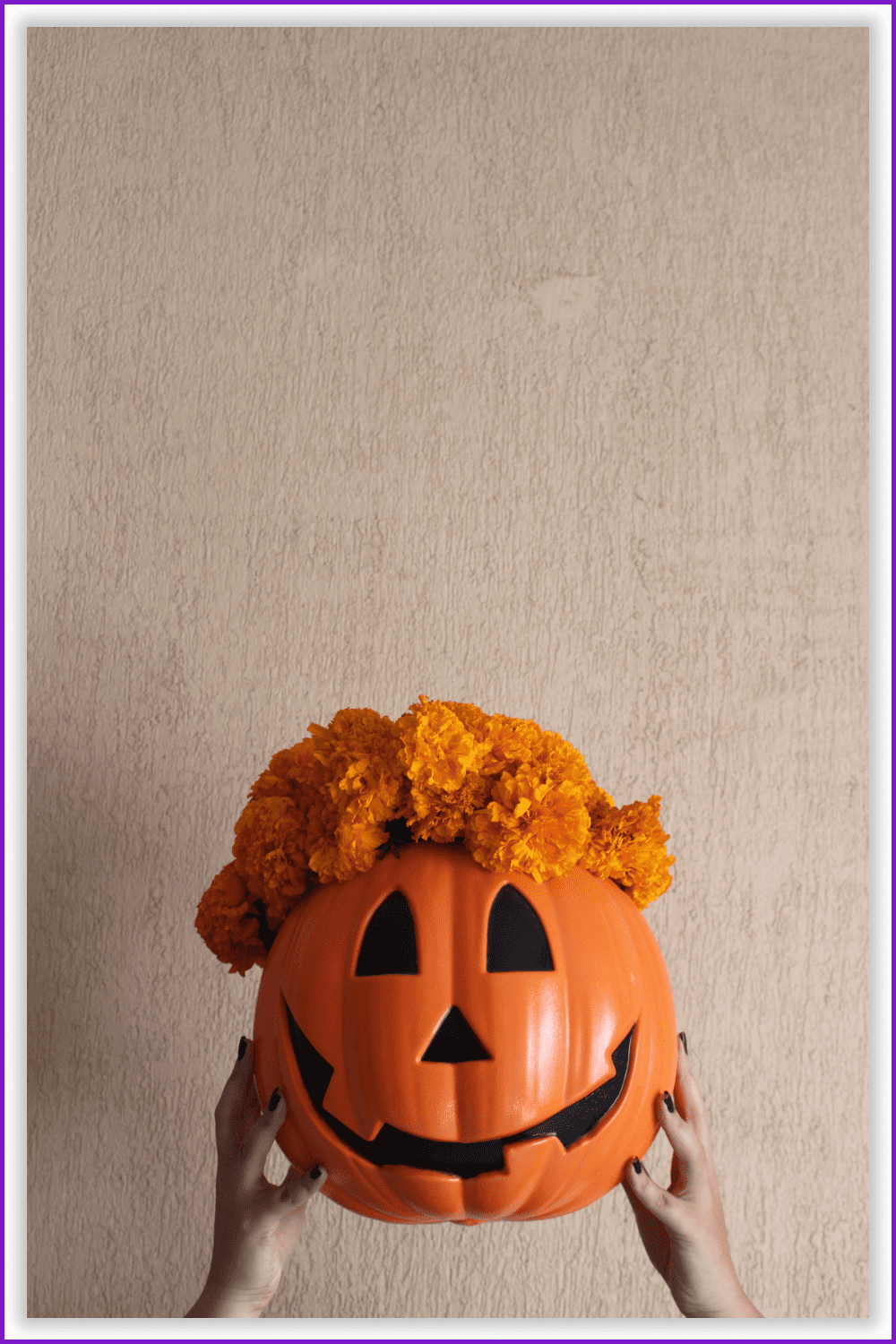 Halloween pumpkin with orange flower hair.