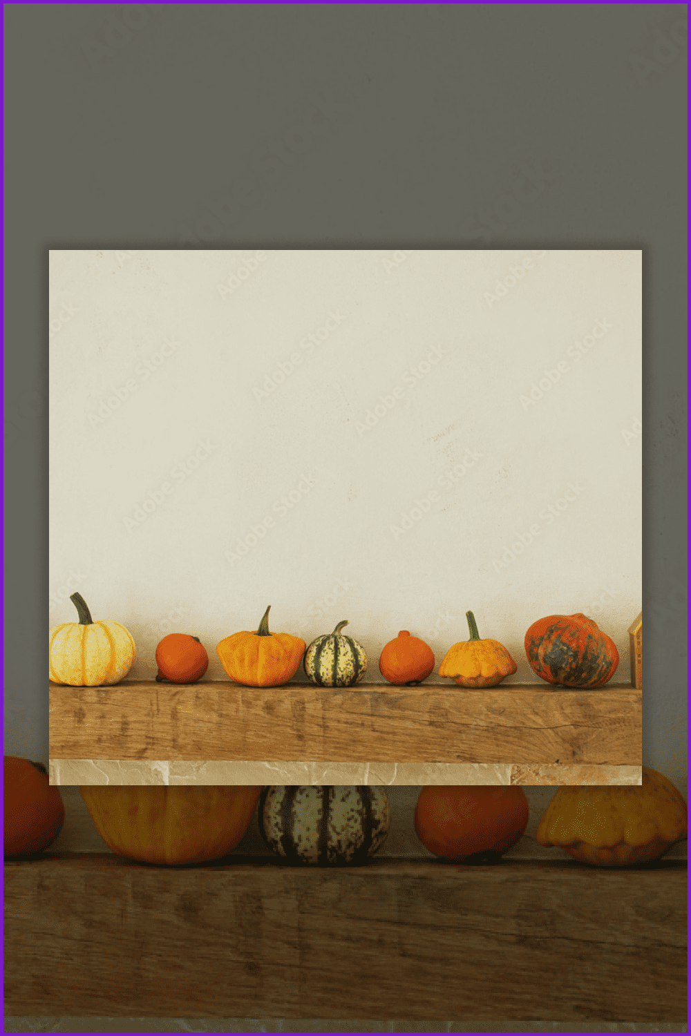 An image of the pumpkins and candles on rustic wood.