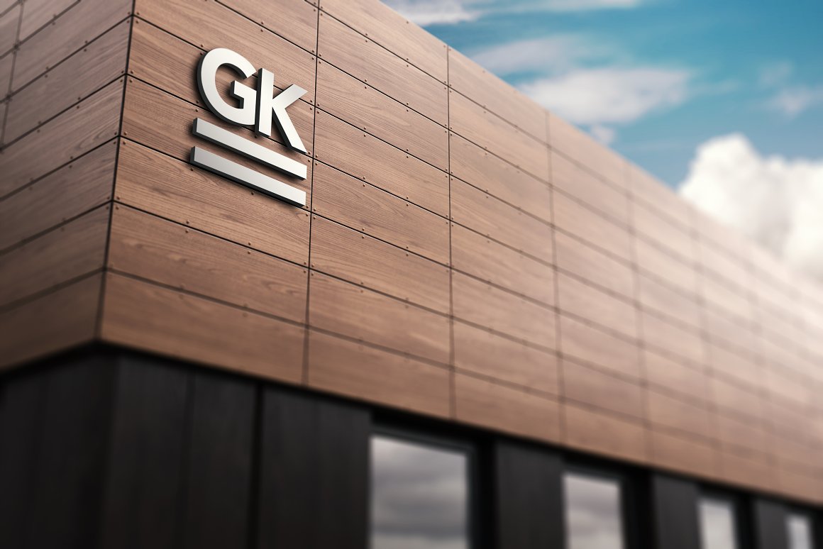 3D wooden signage wall mockup with a silver logo "GK".