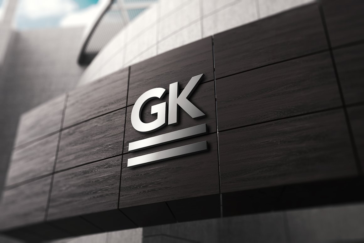 3D dark brown signage wall mockup with a silver logo "GK".