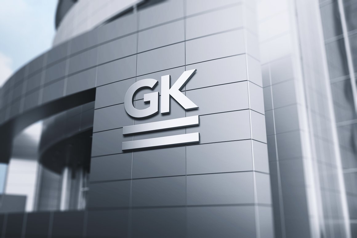 3D silver signage wall mockup with a silver logo "GK".