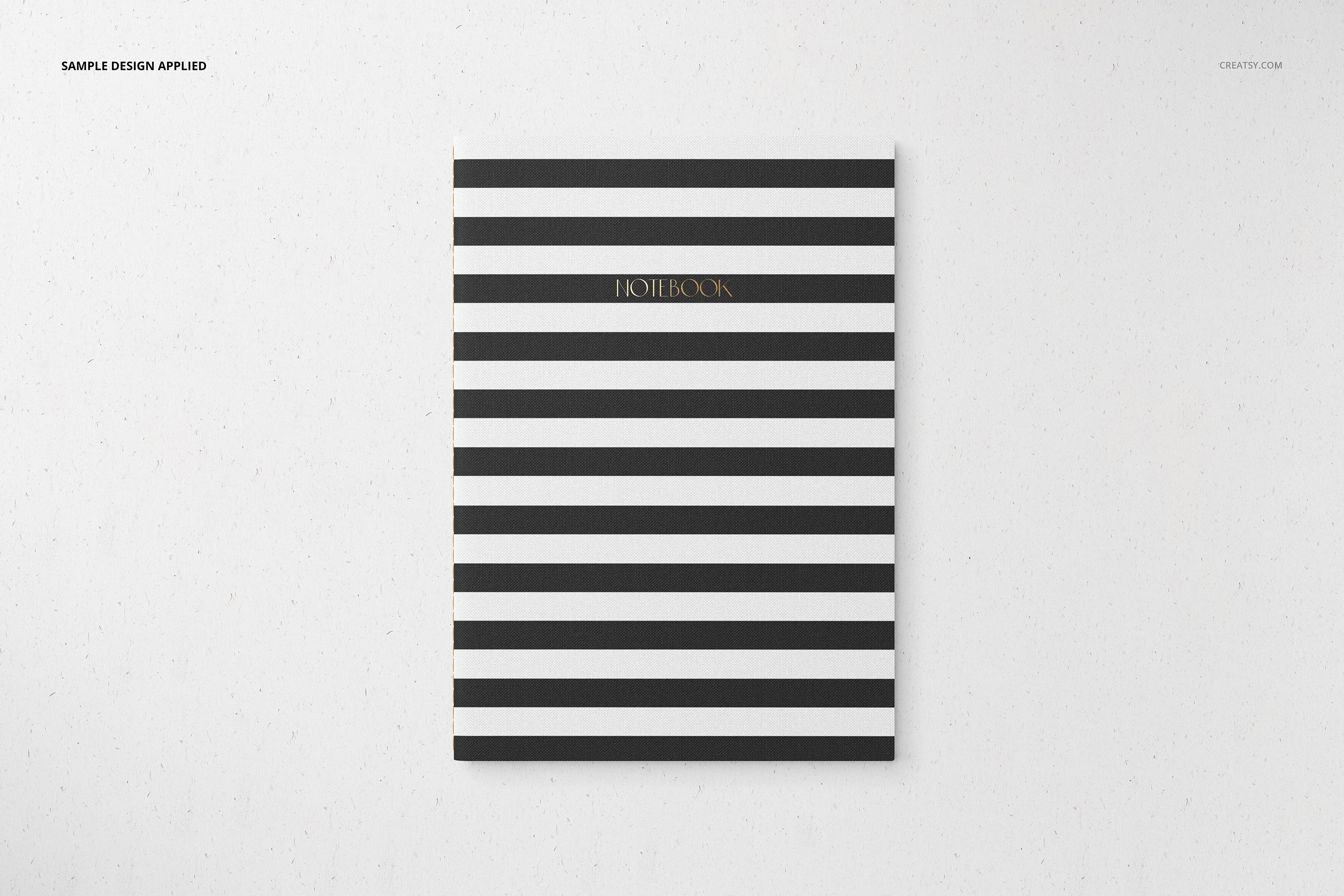 Classic notebook in the black horizontal lines and with the gold font.