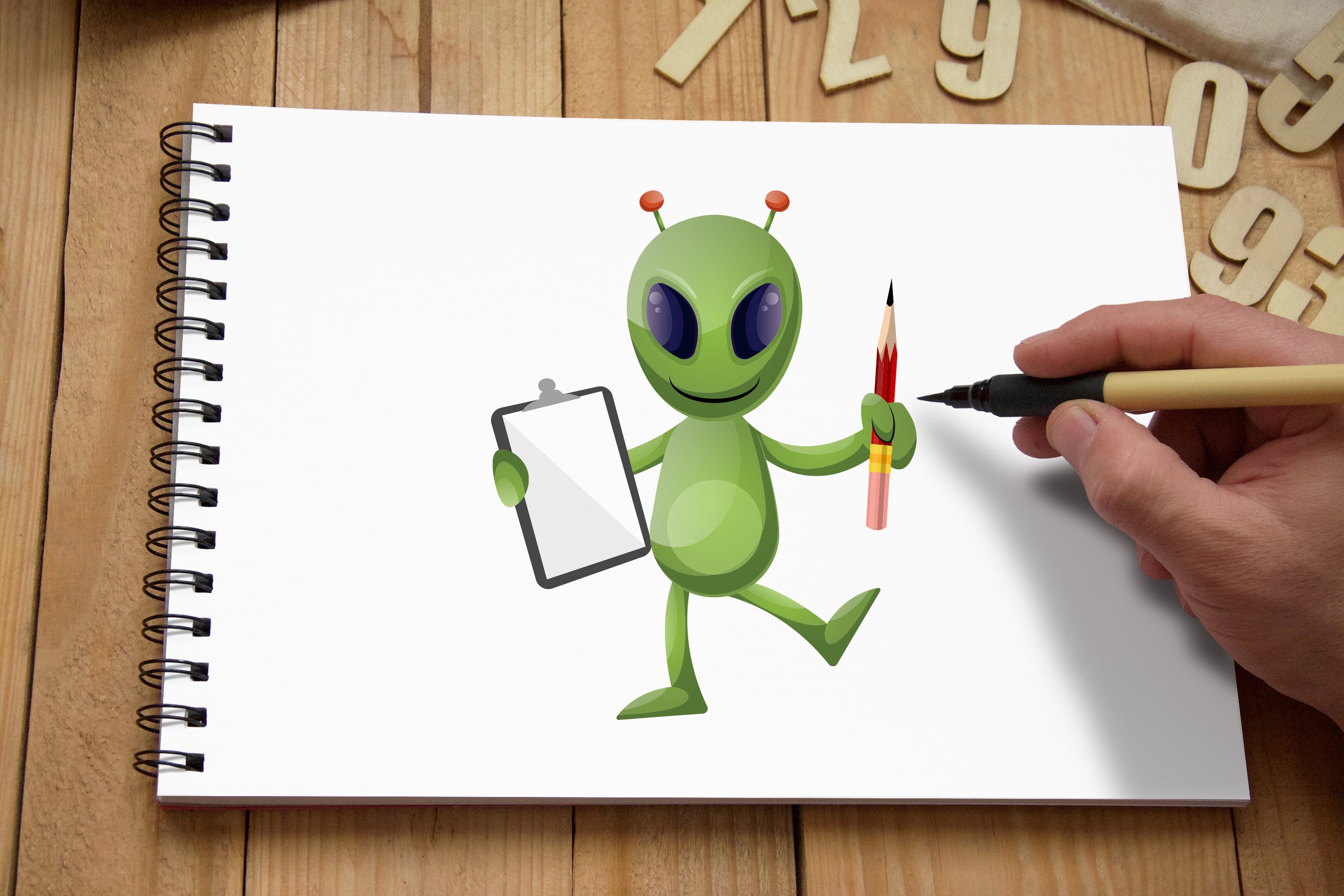 The image of a cheerful alien on the landscape sheet.