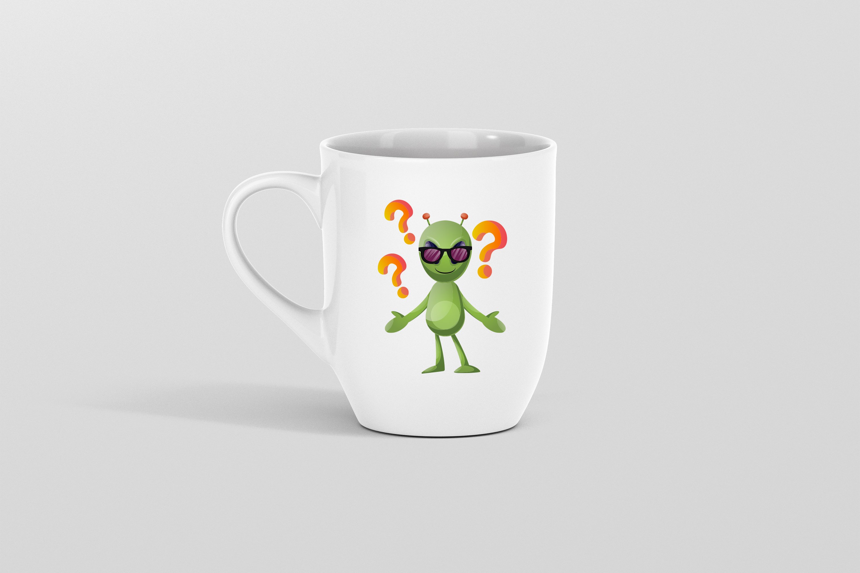 Image of a colorful alien on a white cup.