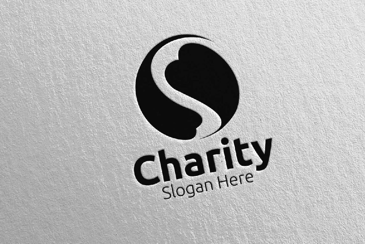 A black 3D charity hand love logo and black lettering "Charity slogan here" on a gray background.