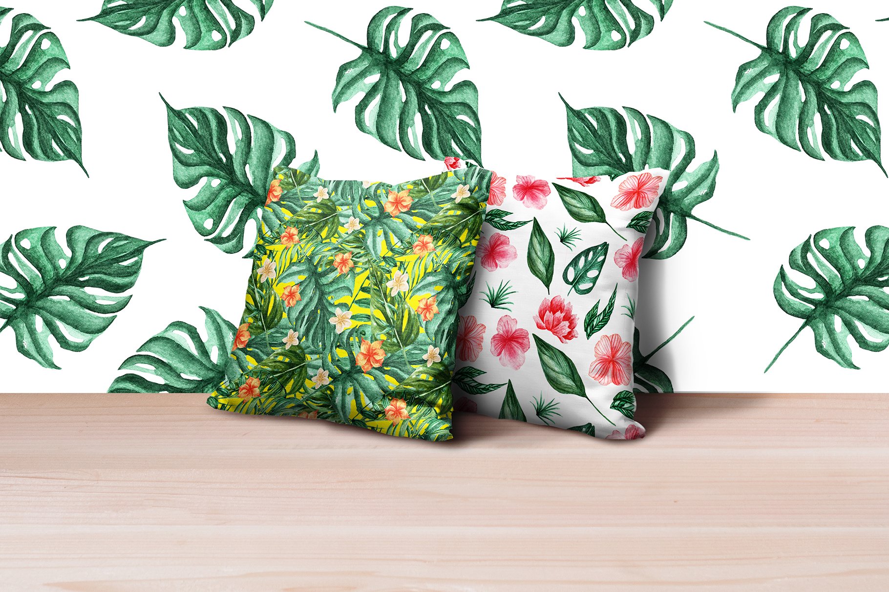 Two pillows with the leaves illustrations.