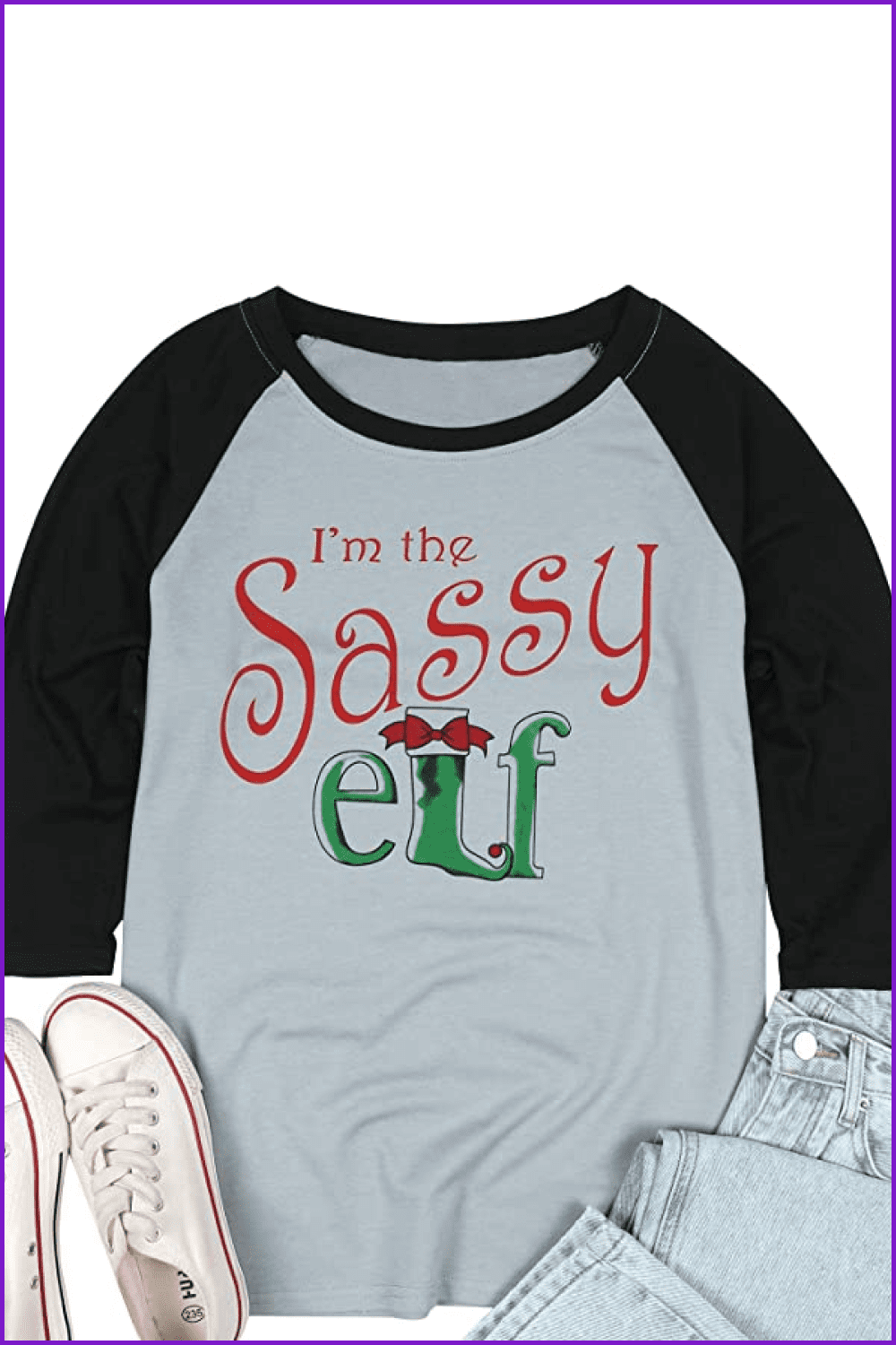 T-shirt with long red sleeves and the bright phrase I'm the Sassy elf.
