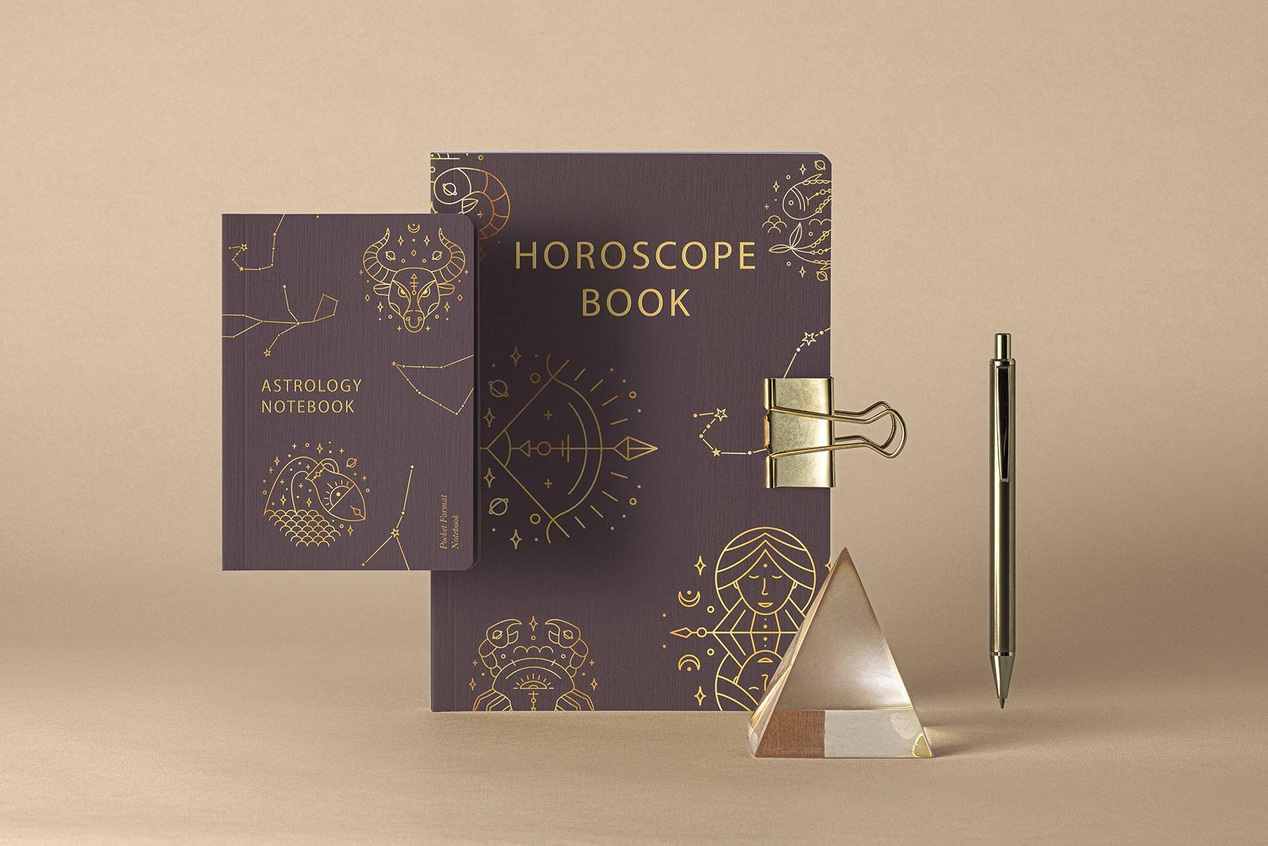 Brown card and notebook with the gold zodiac elements.