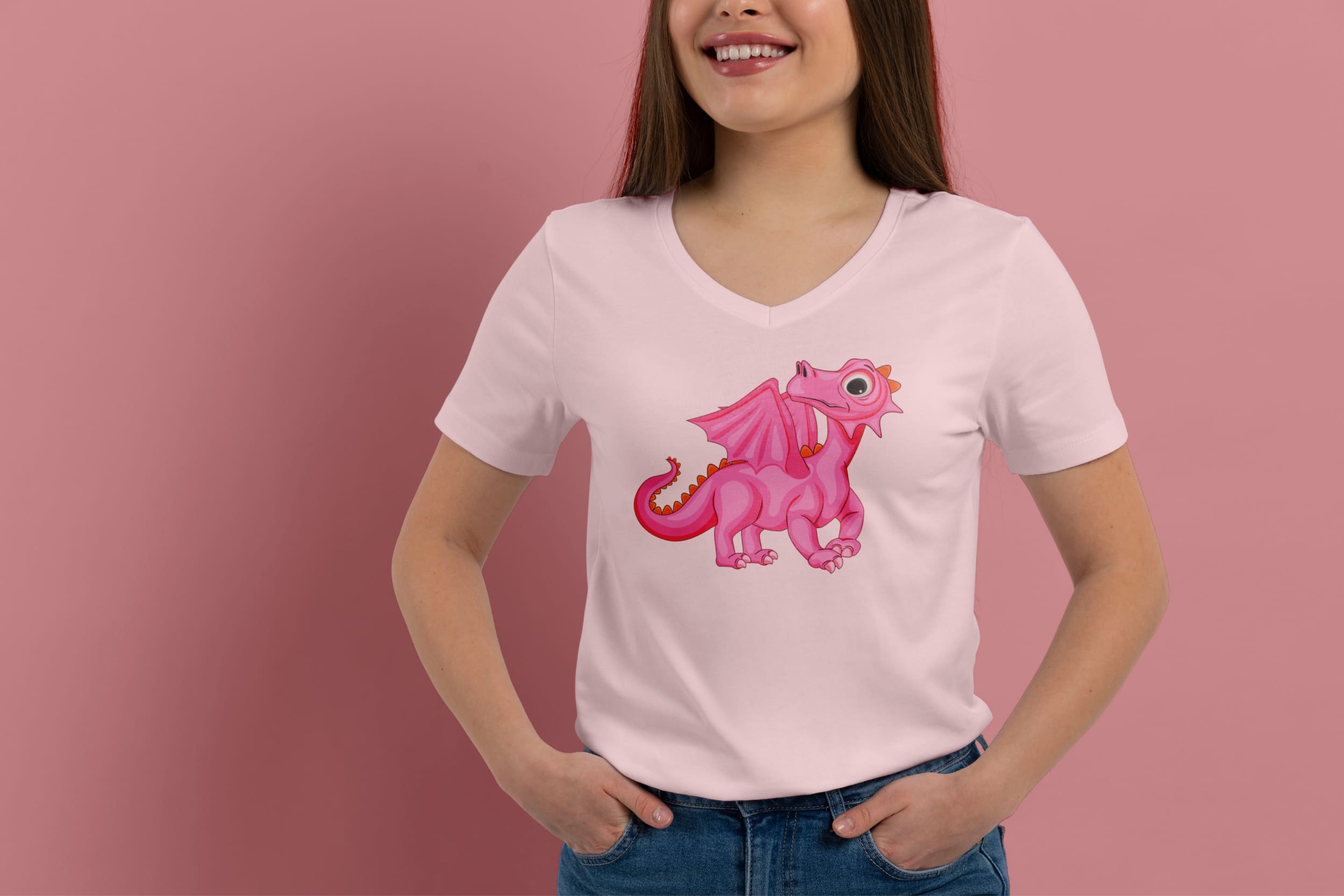 Light pink t-shirt on a girl with a pink baby dragon, on a pink background.