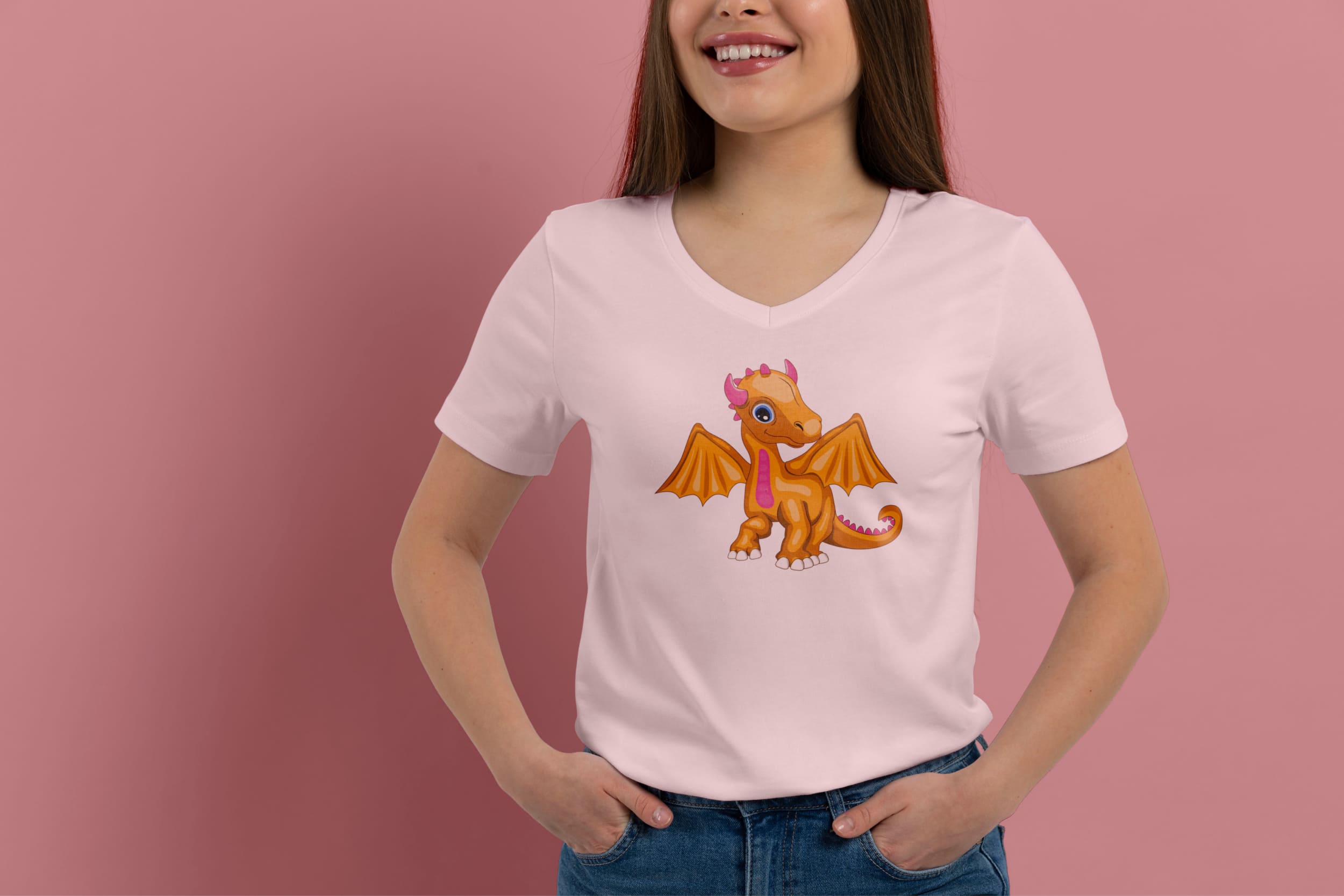 Light pink t-shirt on a girl with an orange baby dragon, on a pink background.
