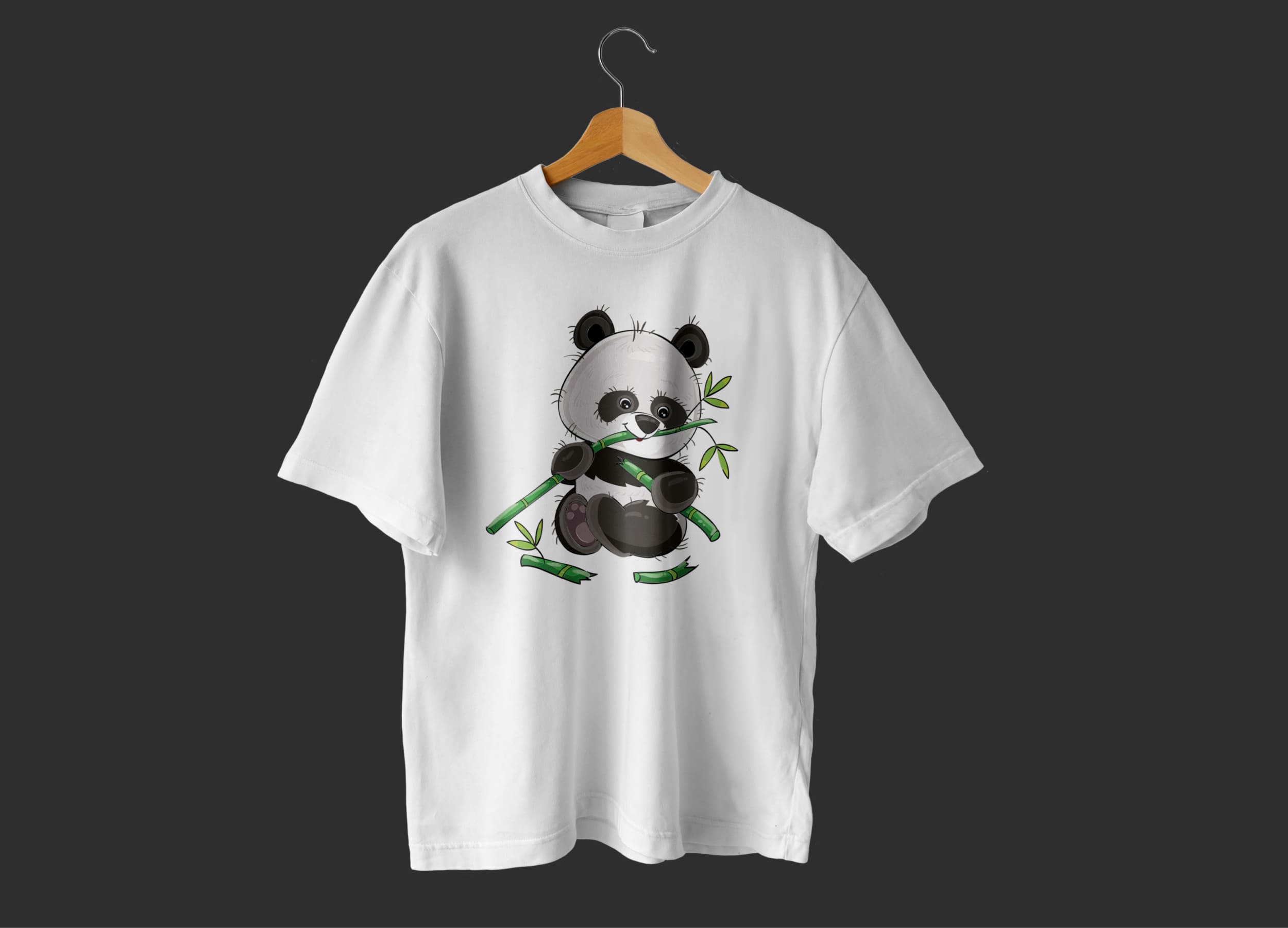 A white t-shirt with a baby panda gnawing on a branch on a wooden hanger on a dark gray background.