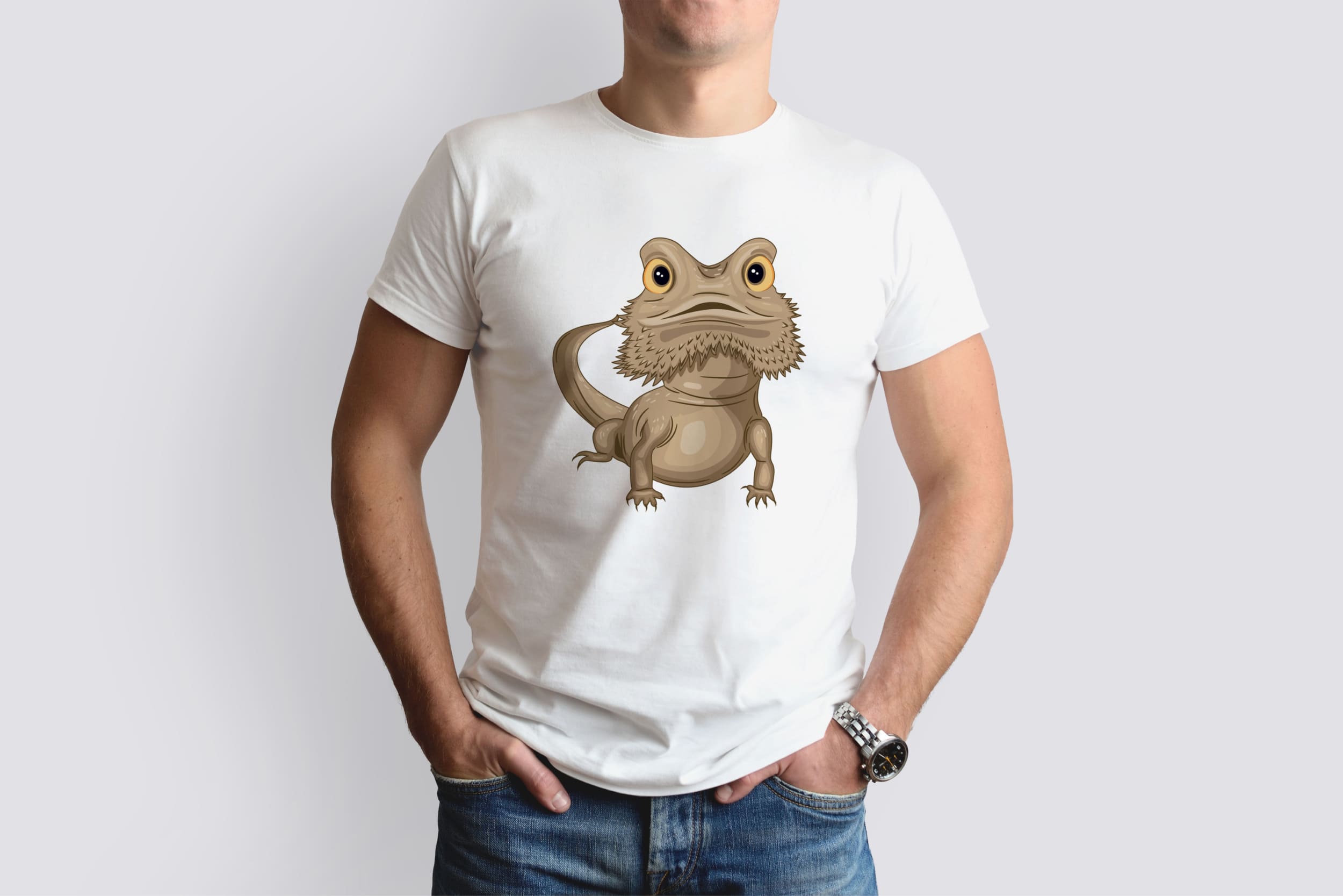 A white t-shirt on a man with an image of a brown bearded dragon, who looks ahead.