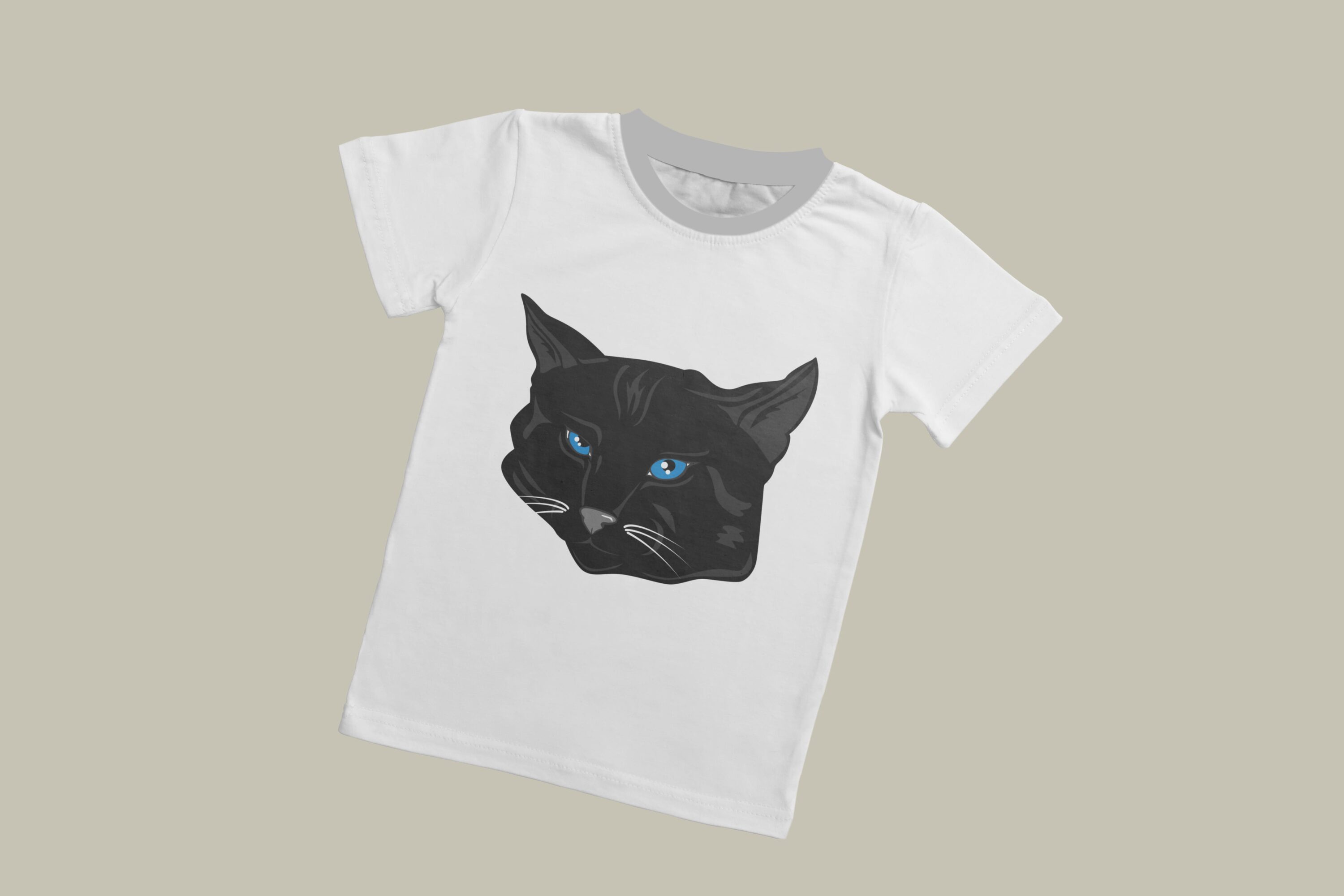 A white T-shirt with a grey collar and the face of a black cat with blue eyes on a grey background.